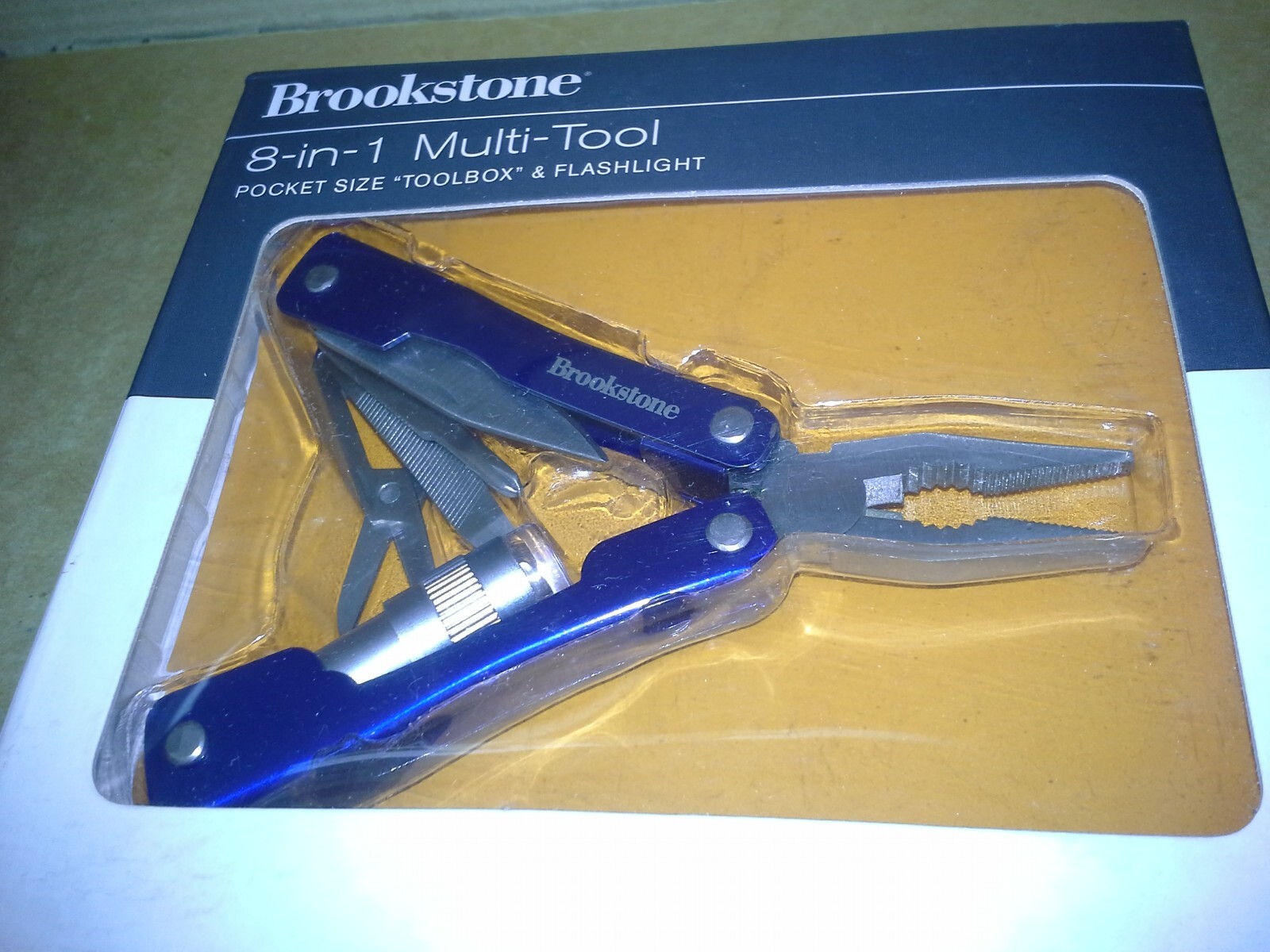 Brookstone 725704 Blue 8-in-1 multi-tool pocket size toolbox. Working. VGC