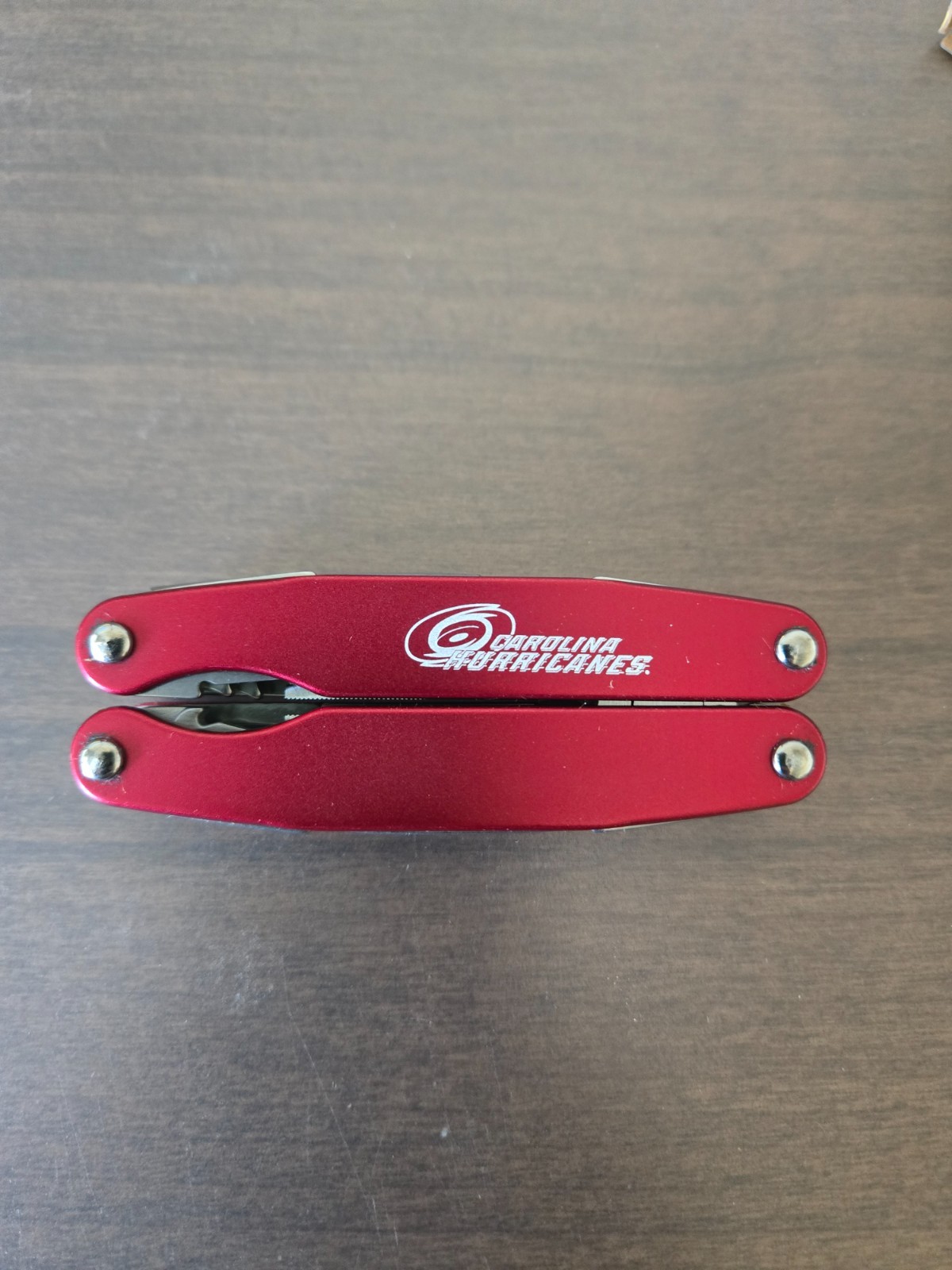 Retired Gen 1 Red “Carolina Hurricanes” Leatherman Juice C2 Multitool