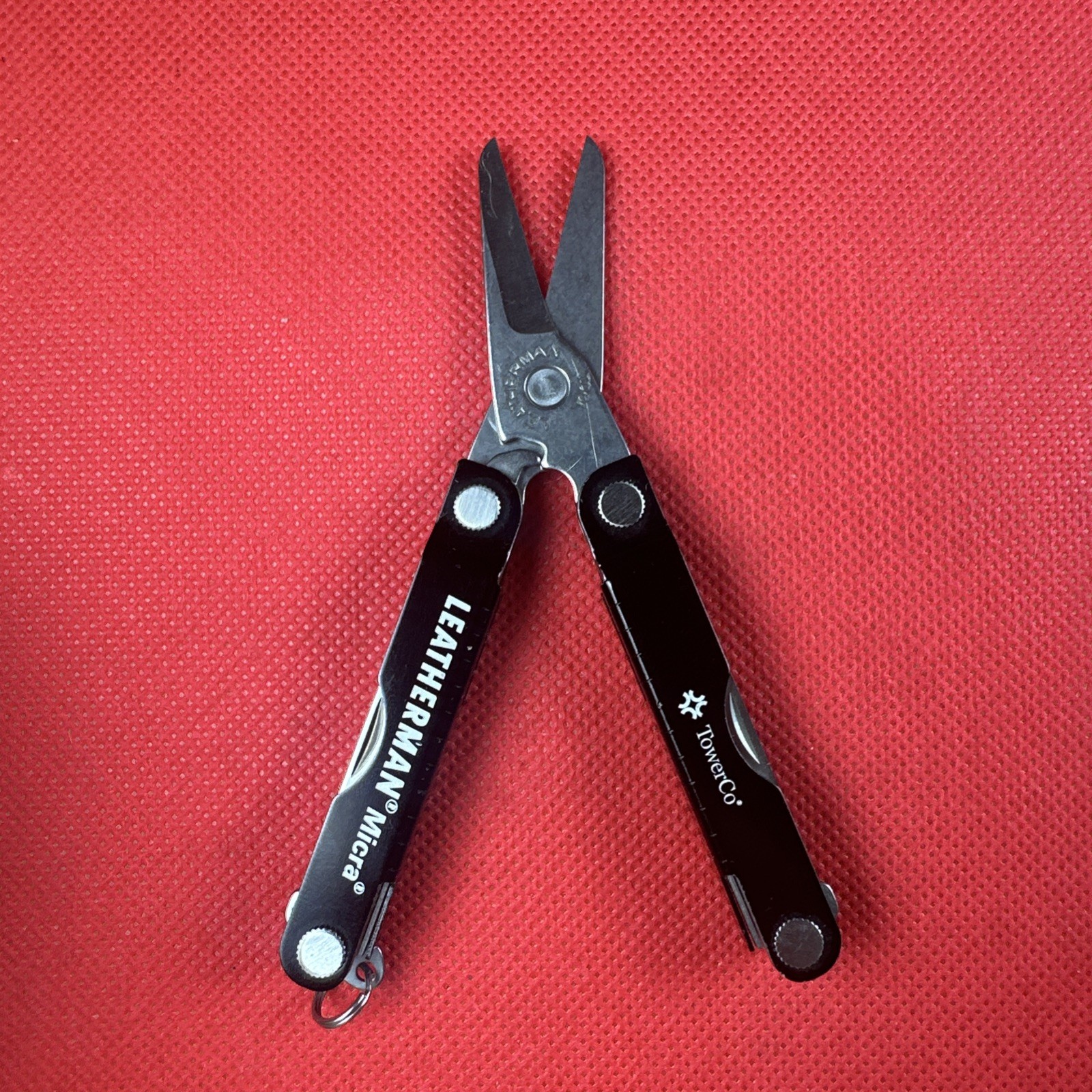 Nice Black Leatherman Micra Multi-Tool, scissor, knife, tweezer, screwdriver