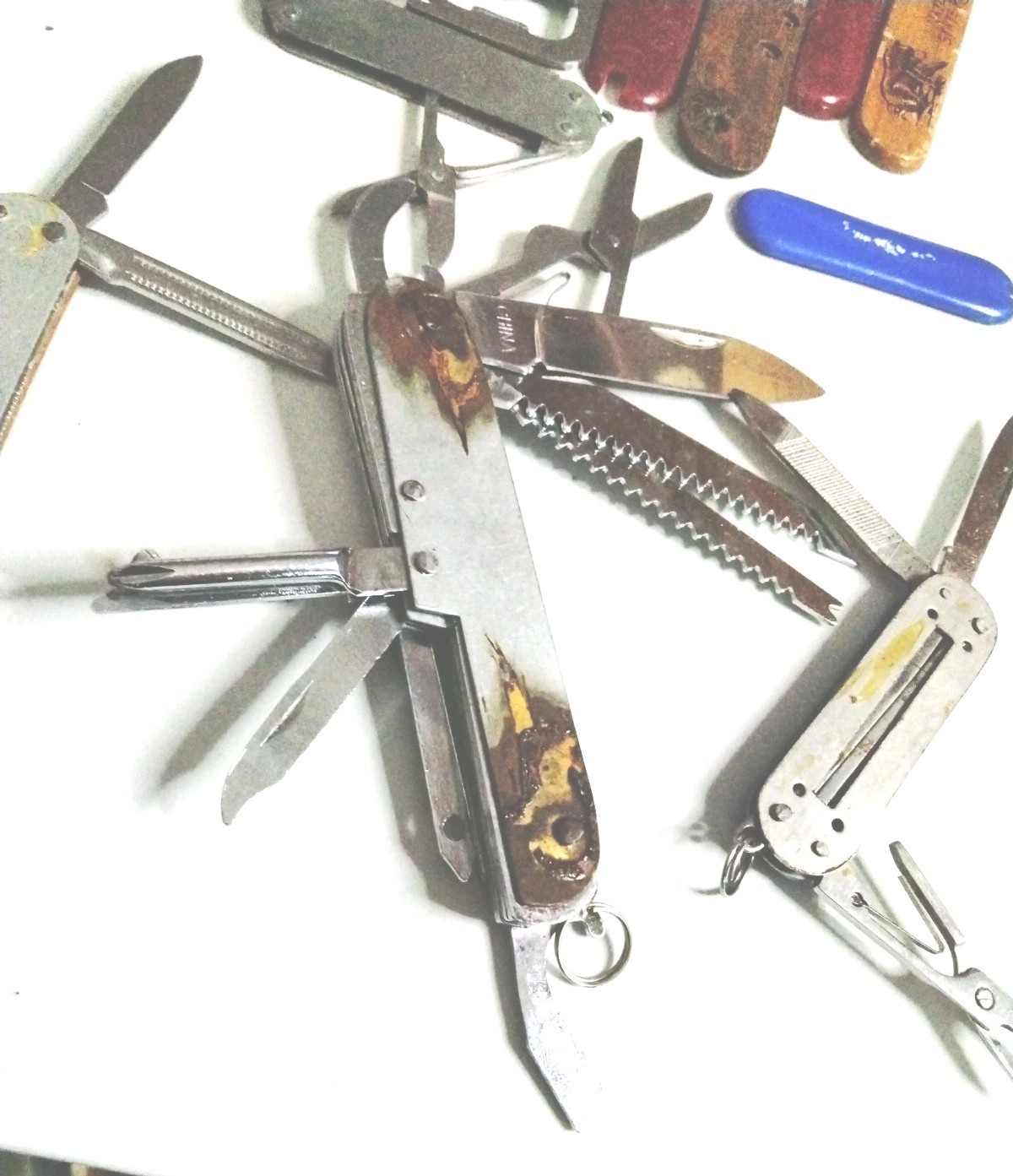Set Of 8 Generic Multi Tools Pliers Knives Saw Blades Folding Folder Tool