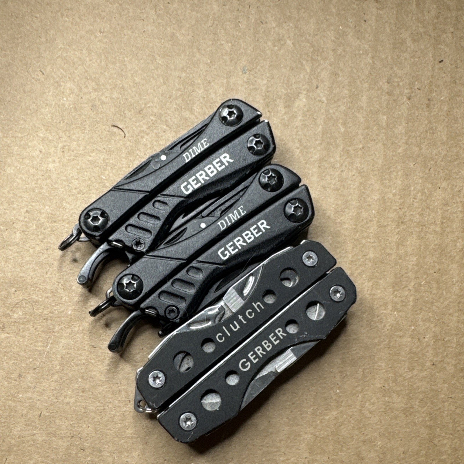 (2) Gerber Dime Multi Tools And (1) Gerber Clutch