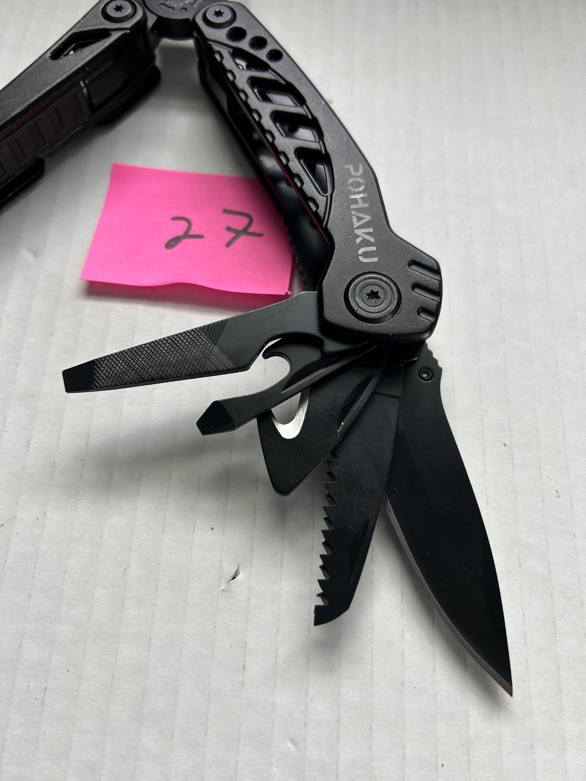 Pohaku Multi Tool with belt holder