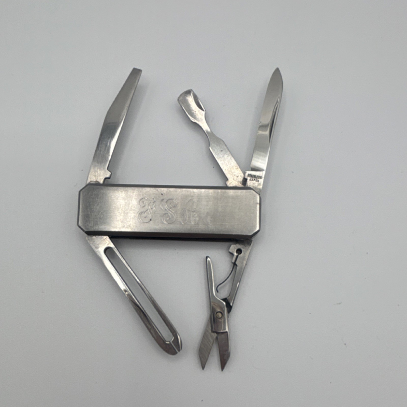 Stainless Steel 5-in-1 Multi-Tool Silver Knife Scissors File Bottle Opener
