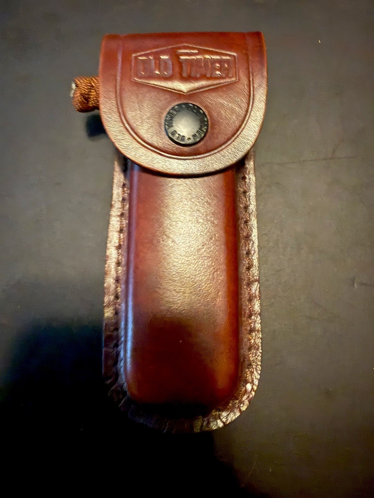 leatherman sidekick multi tool. With old timer genuine leather case. Lanyard