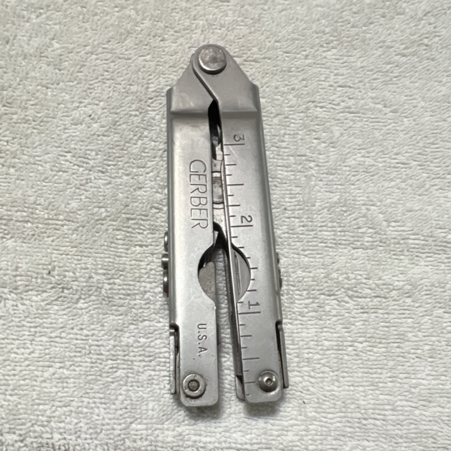Gerber Stainless Steel Multi-Tool 7-in-1 Pliers Knife File Can Opener Ruler
