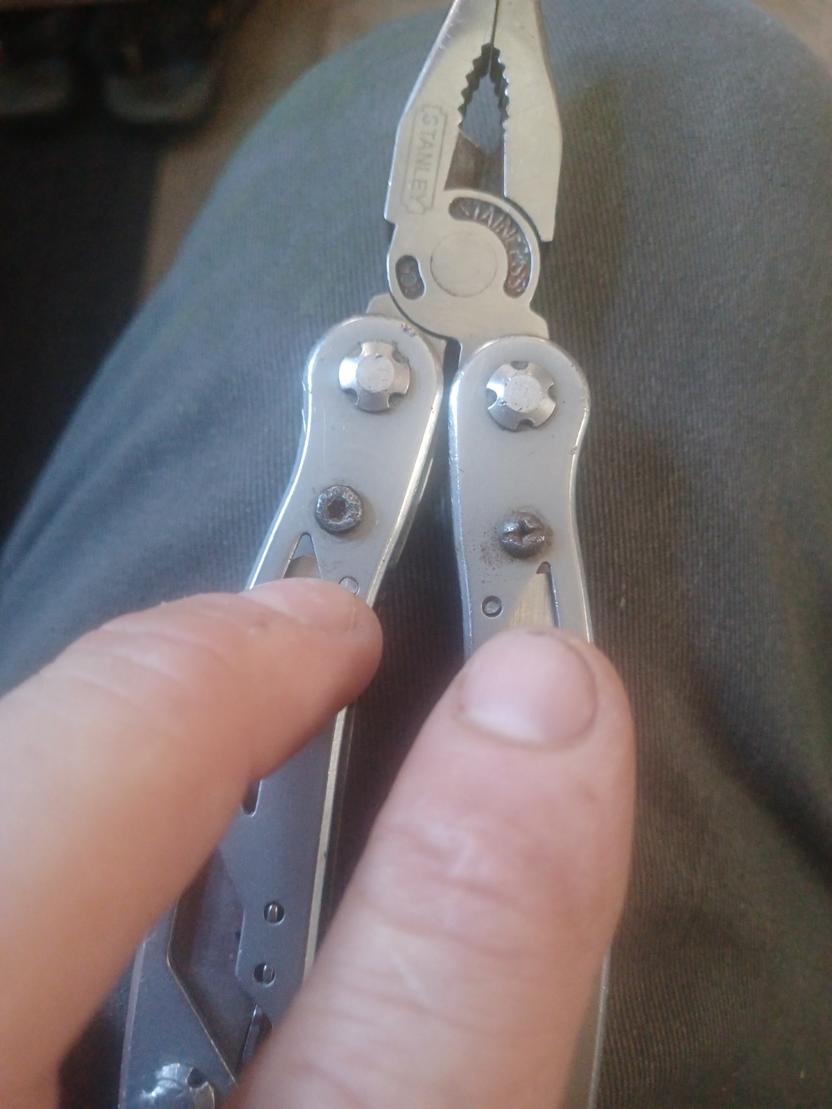 New and Used STANLEY -IN-1 STAINLESS STEEL MULTITOOL WITH BLACK POUCH (84-519)