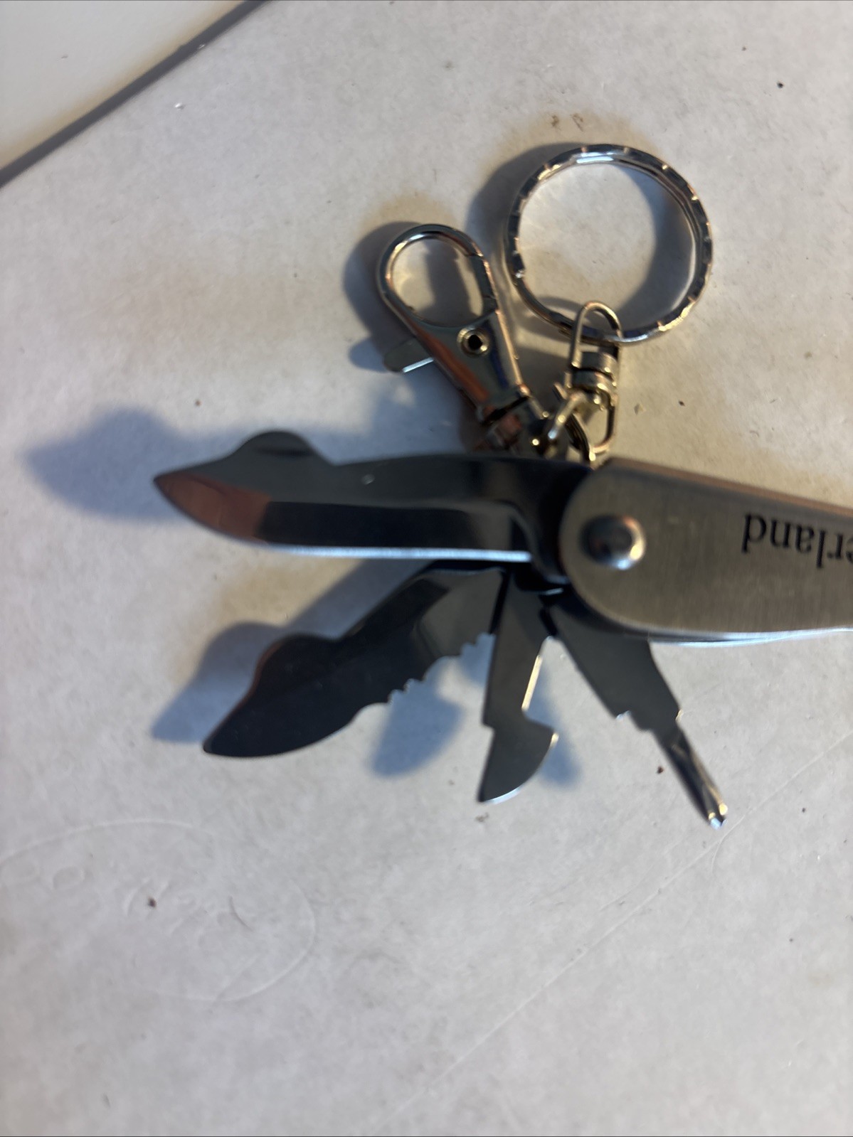 Multi tool folding Knives, pliers/light From Switzerland