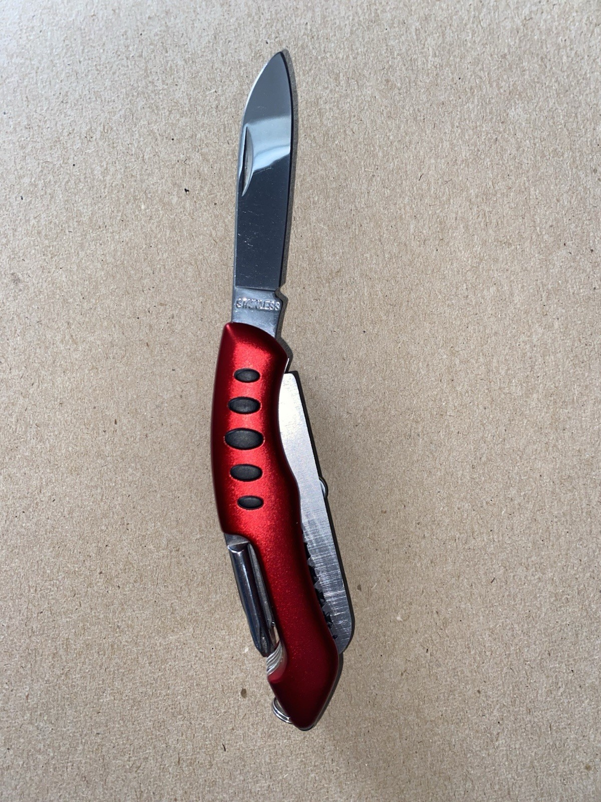 The Sharper Image Multi-Tool 11 in 1 Pocket Knife similar to a Swiss Army knife