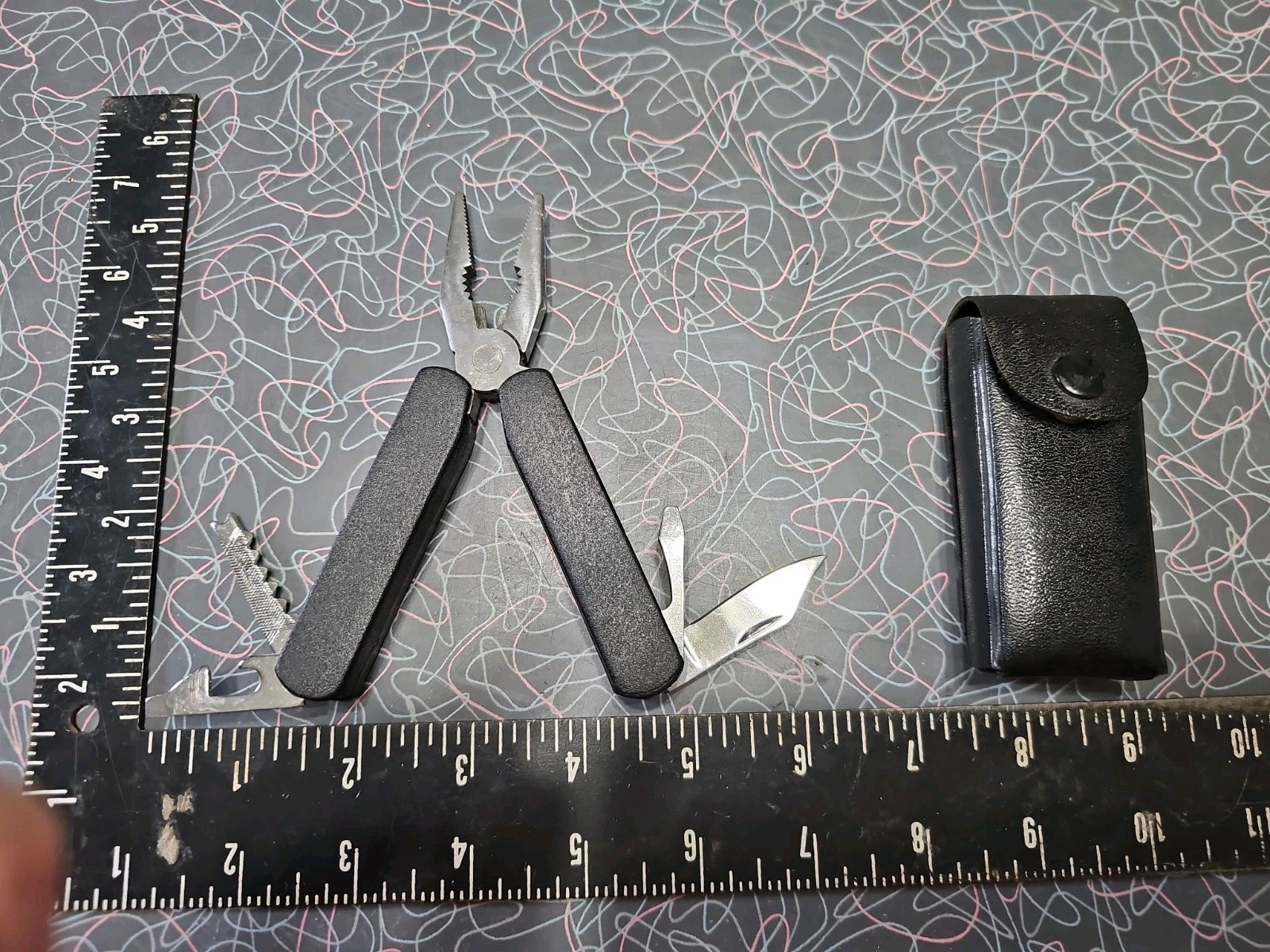 Vintage Multi-Tool with Black Belt Sheath Made in China Pliers Knife Screwdriver