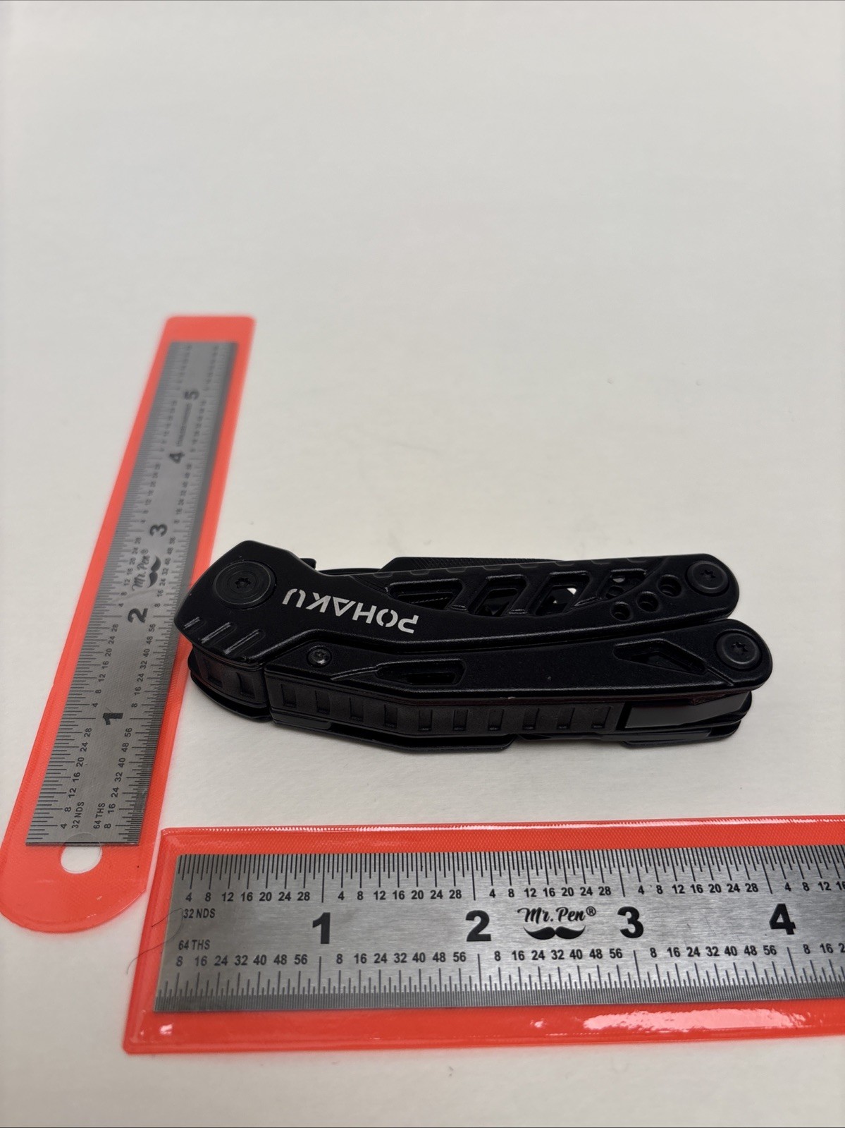 POHAKU BLACK MULTI-TOOL WITH PLIERS, KNIFE, SAW, FILE, SCREWDRIVERS