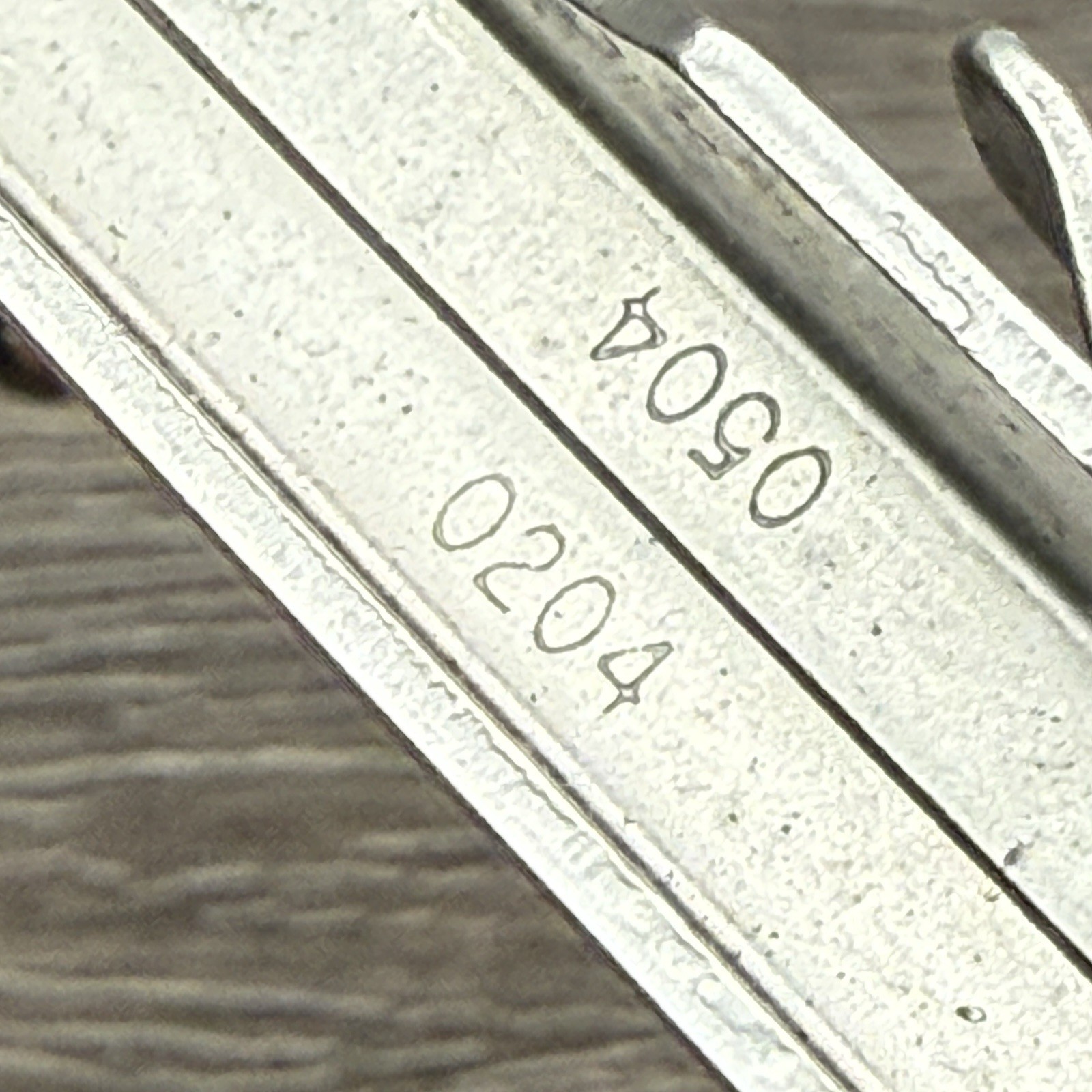 Leatherman Sideclip multitool. Lightly used. Late Run: shiny factory polished