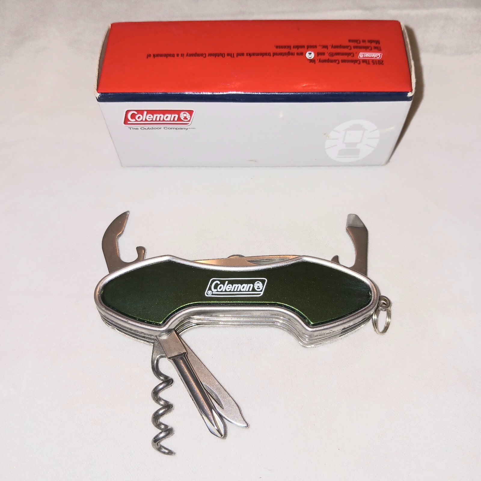 Amazing 3 and 1/2″ Coleman Multi Function Knife NOS, 7 Tools In It!!
