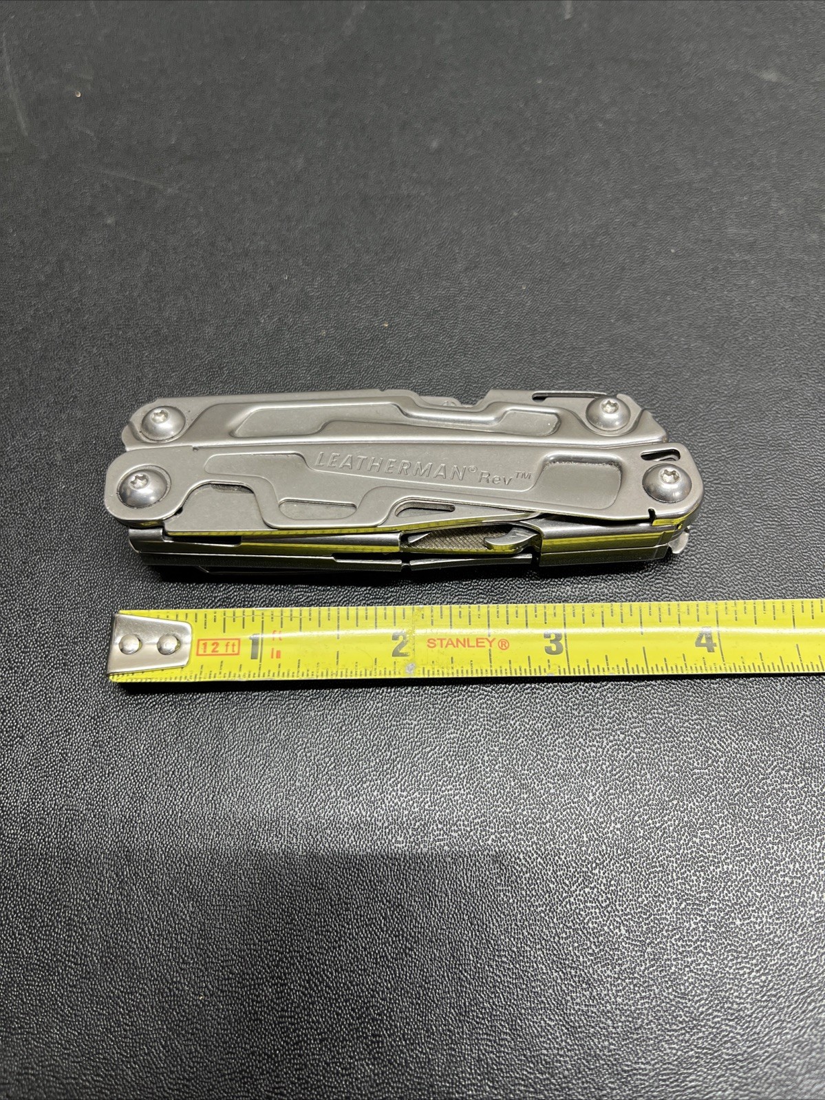 Leatherman Rev Pocket Size Carry-on Stainless Steel Multi-tool, & Engraved