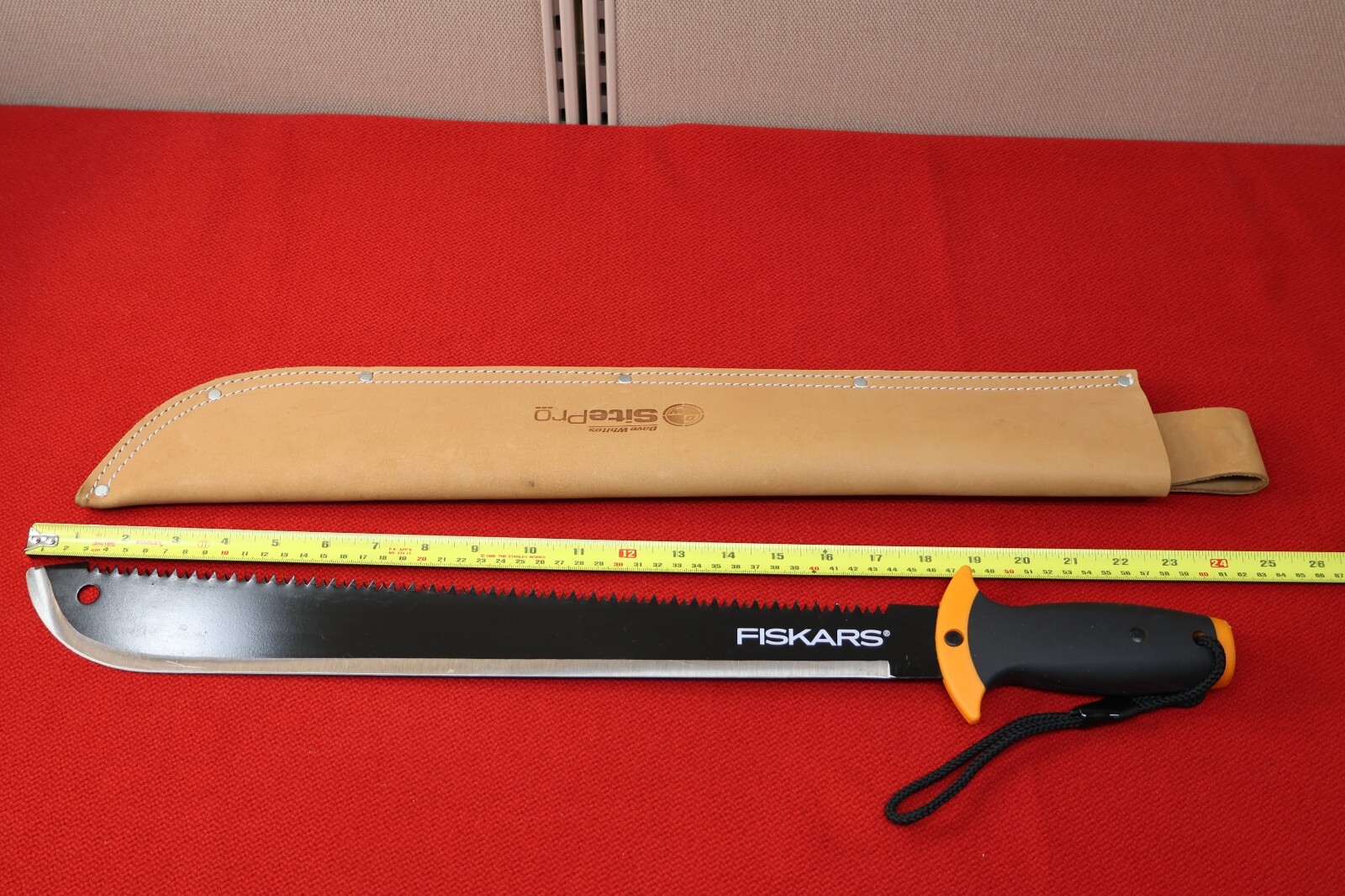24 inch long Fiskars Survival Camping Knife with Dave White’s Leather scabbard