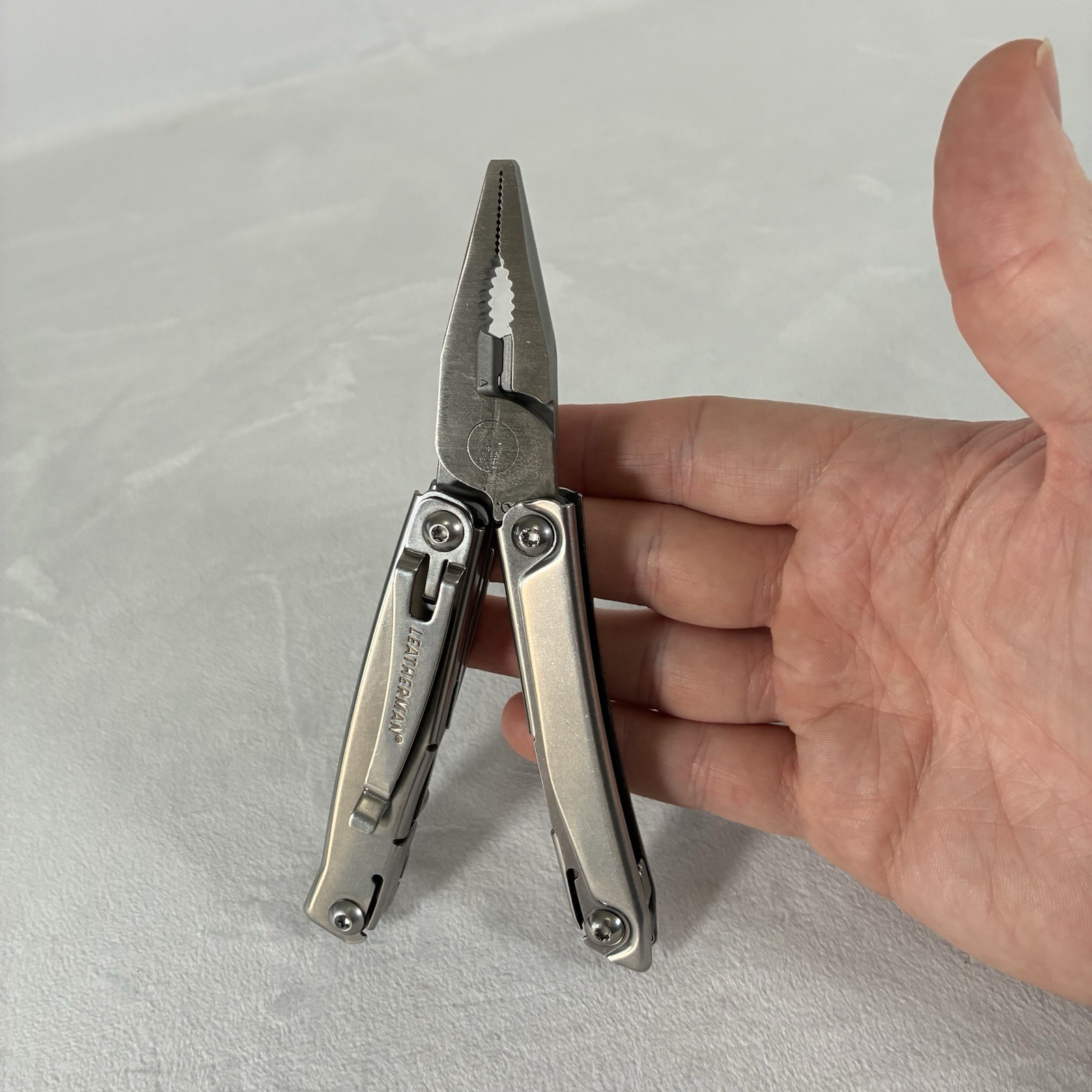 Leatherman Rev Stainless Steel 14-Tool Multi-Tool Pocket Knife w/ Pocket Clip