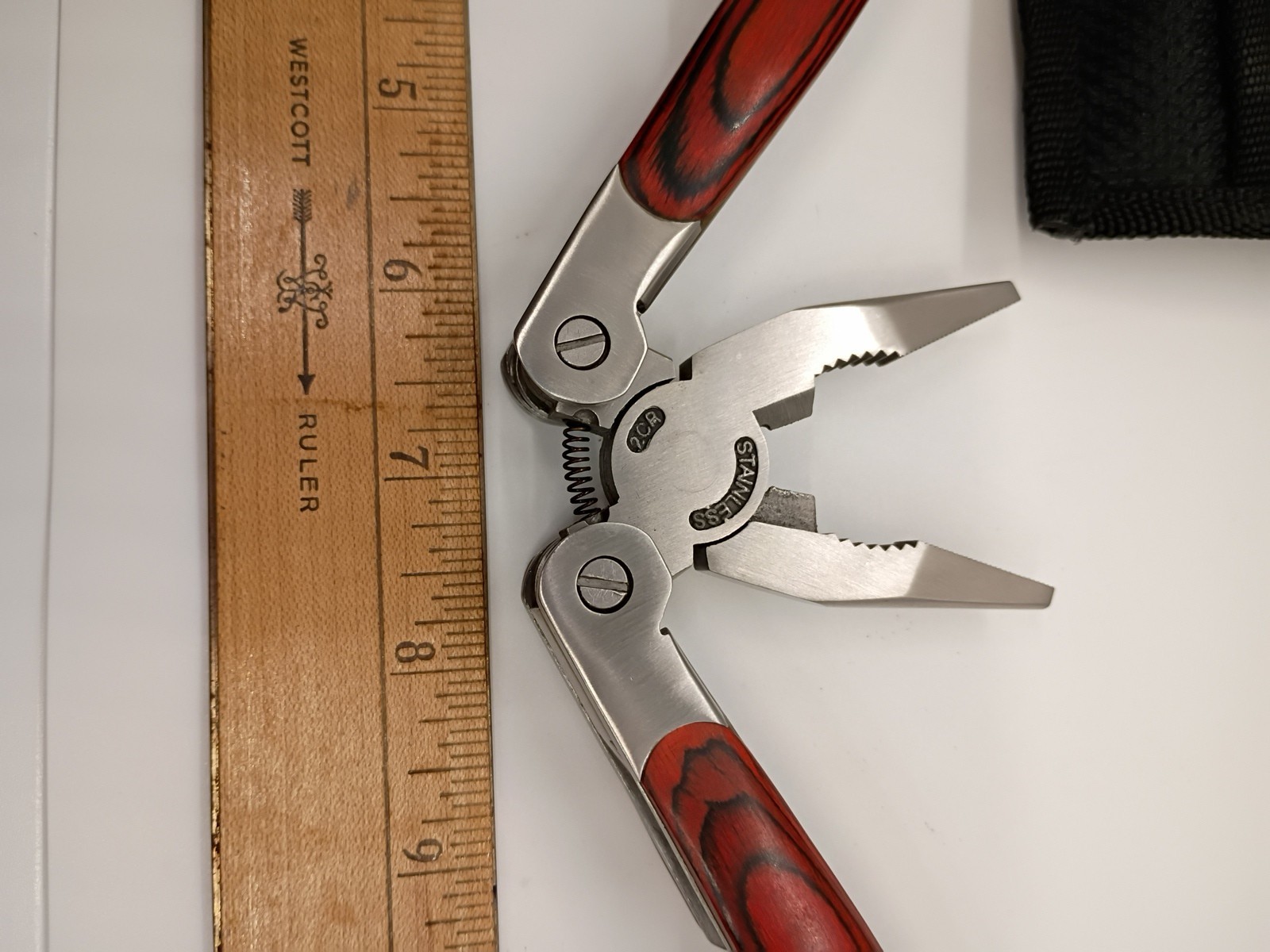 Winchester 10-tool Multi-Tool W/Faux Woodgrain Accents and Black Sheath