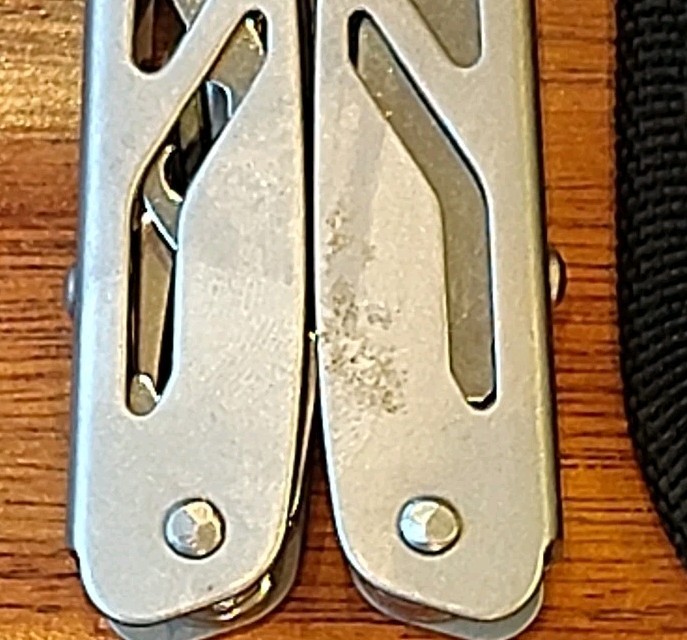 Ozark Trail 12-in-1 Multi Tool Silver Folding Pliers with Belt Sheath