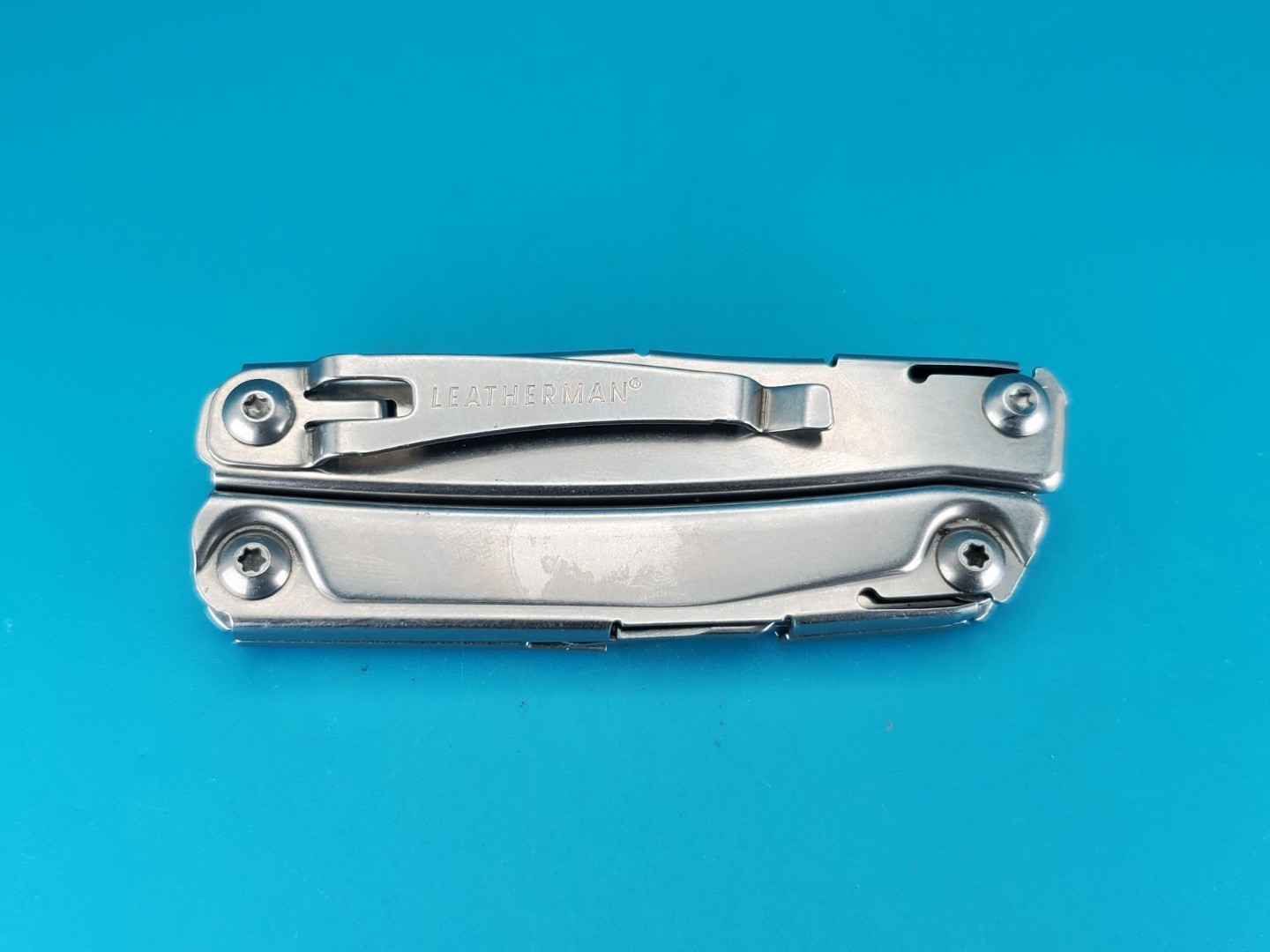 Leatherman Rev 3.8″ Multi-Tool, Stainless! *CHIPPED BLADE TIP*