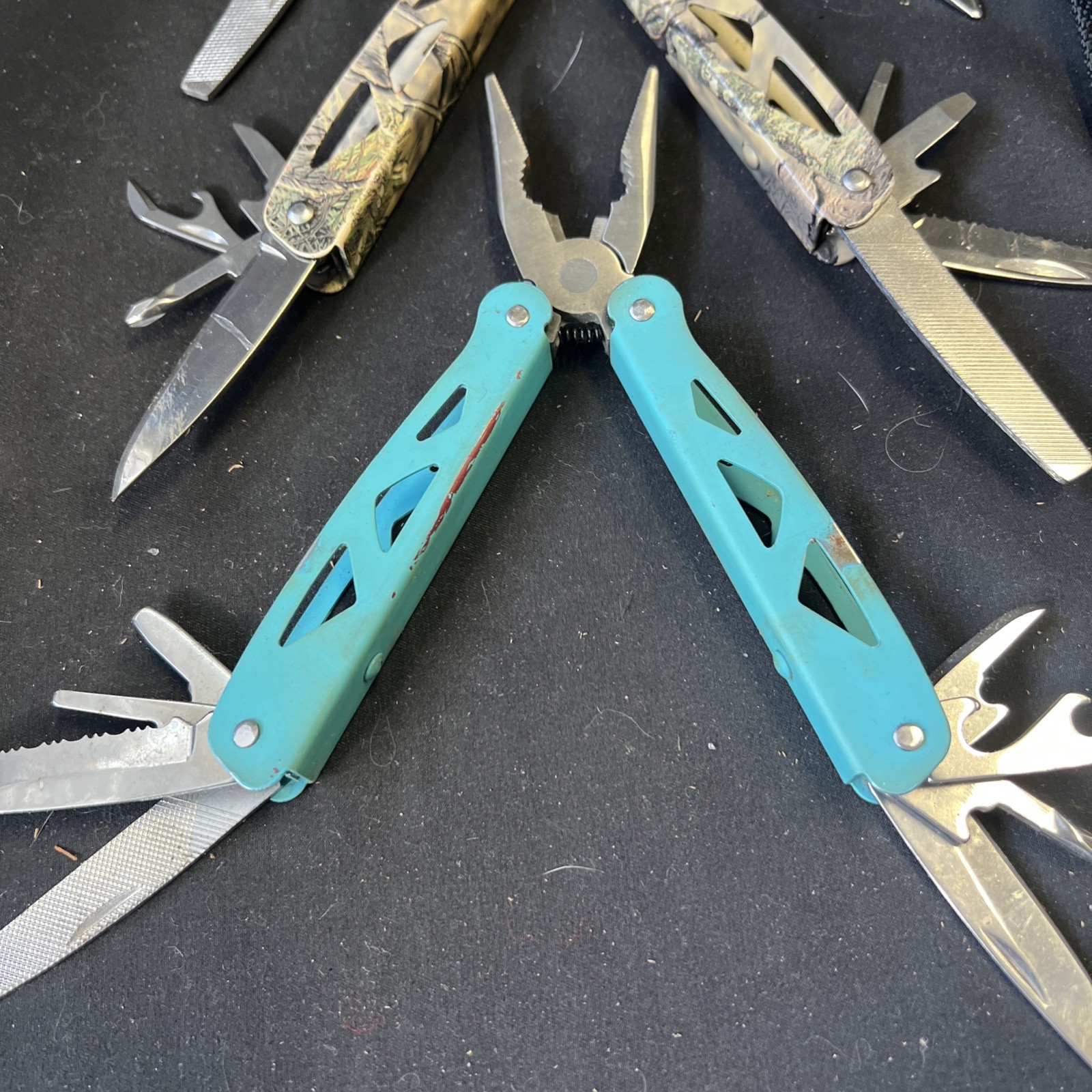 Set Of 3 Ozark Trail Trailside 12-in-1 Multitool – Black, Teal, & Camouflage