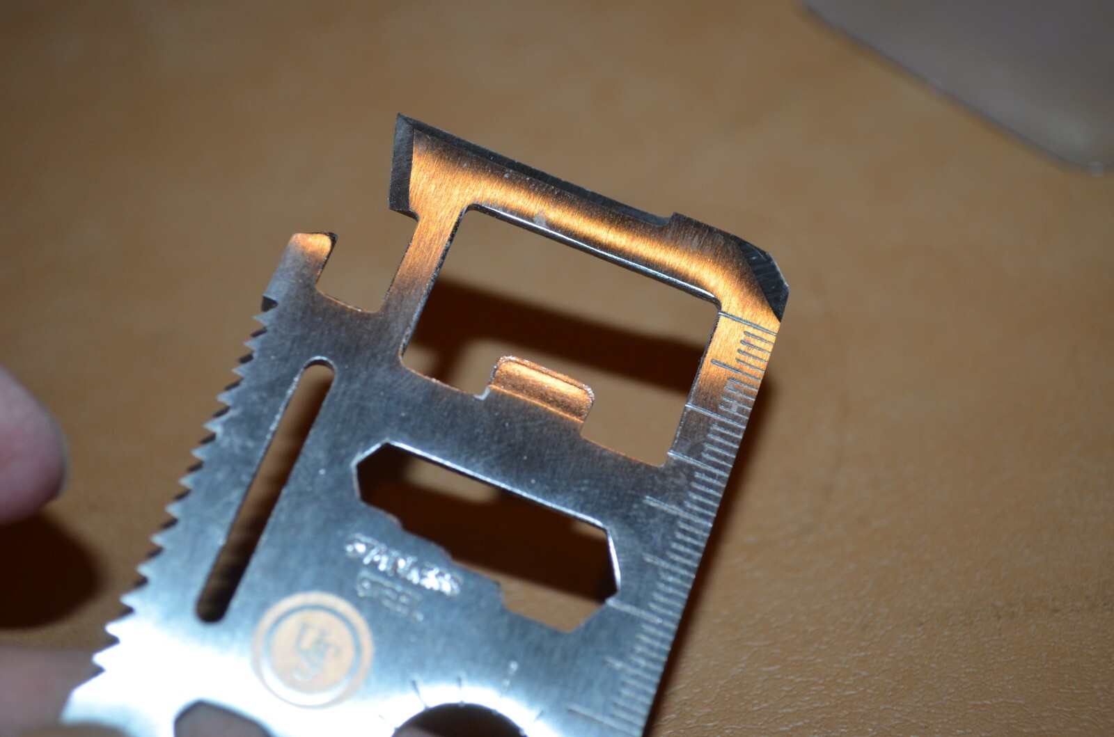 Smallish Wallet Size Multi Survival Tool in Silver Tone in Soft Plastic Case
