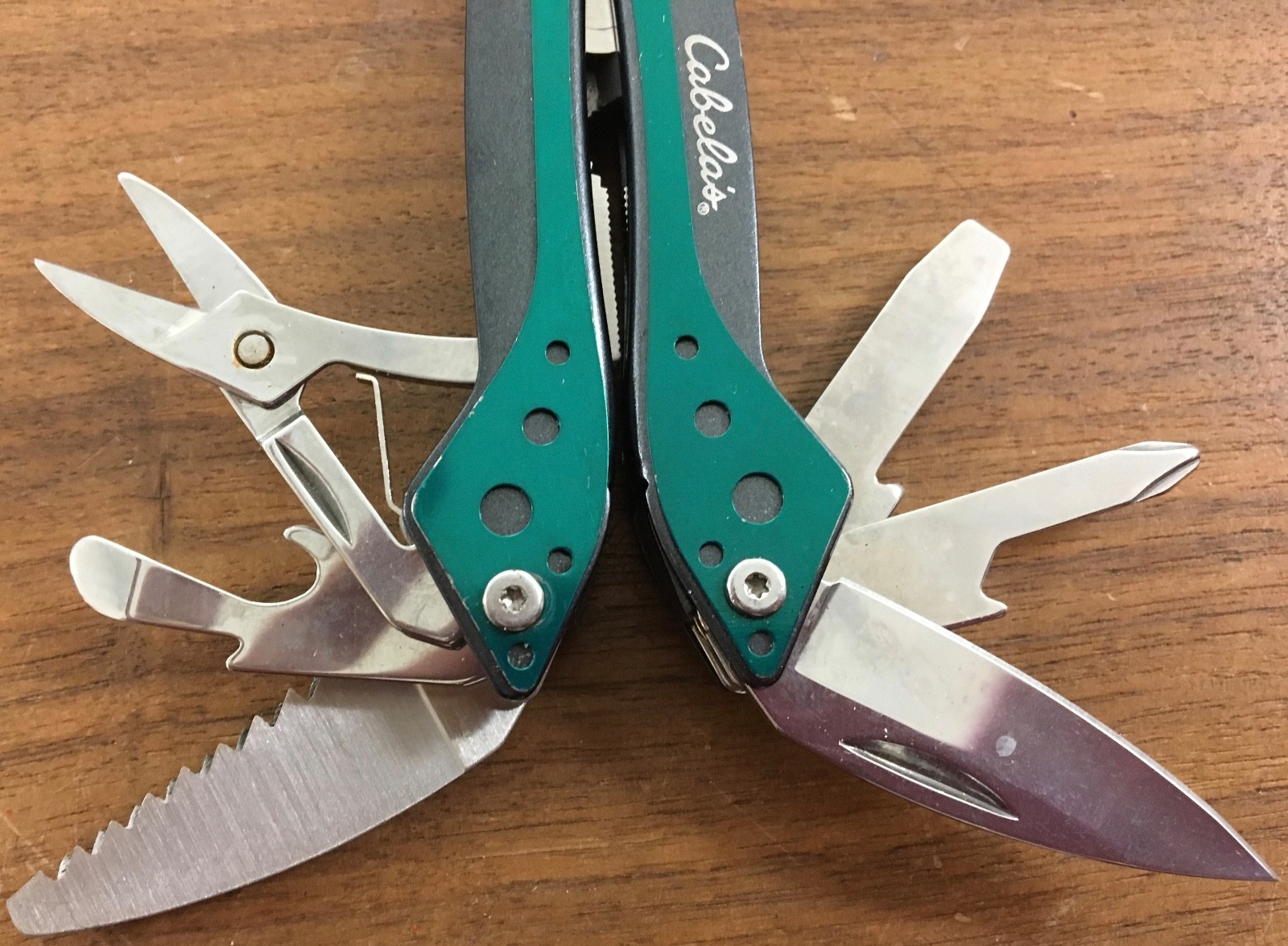 Cabela’s multi tool in hunter green with sheath for camp, hunt, survival, crafts