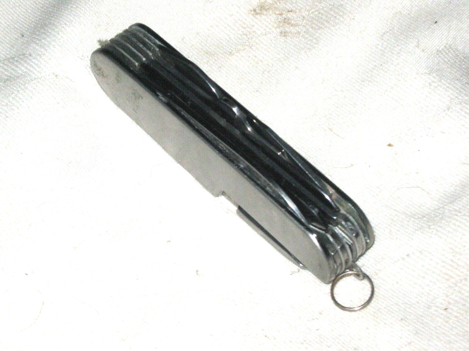 A Small 16-in-1 Stainless Steel Multi Function Tool Pocket Knife