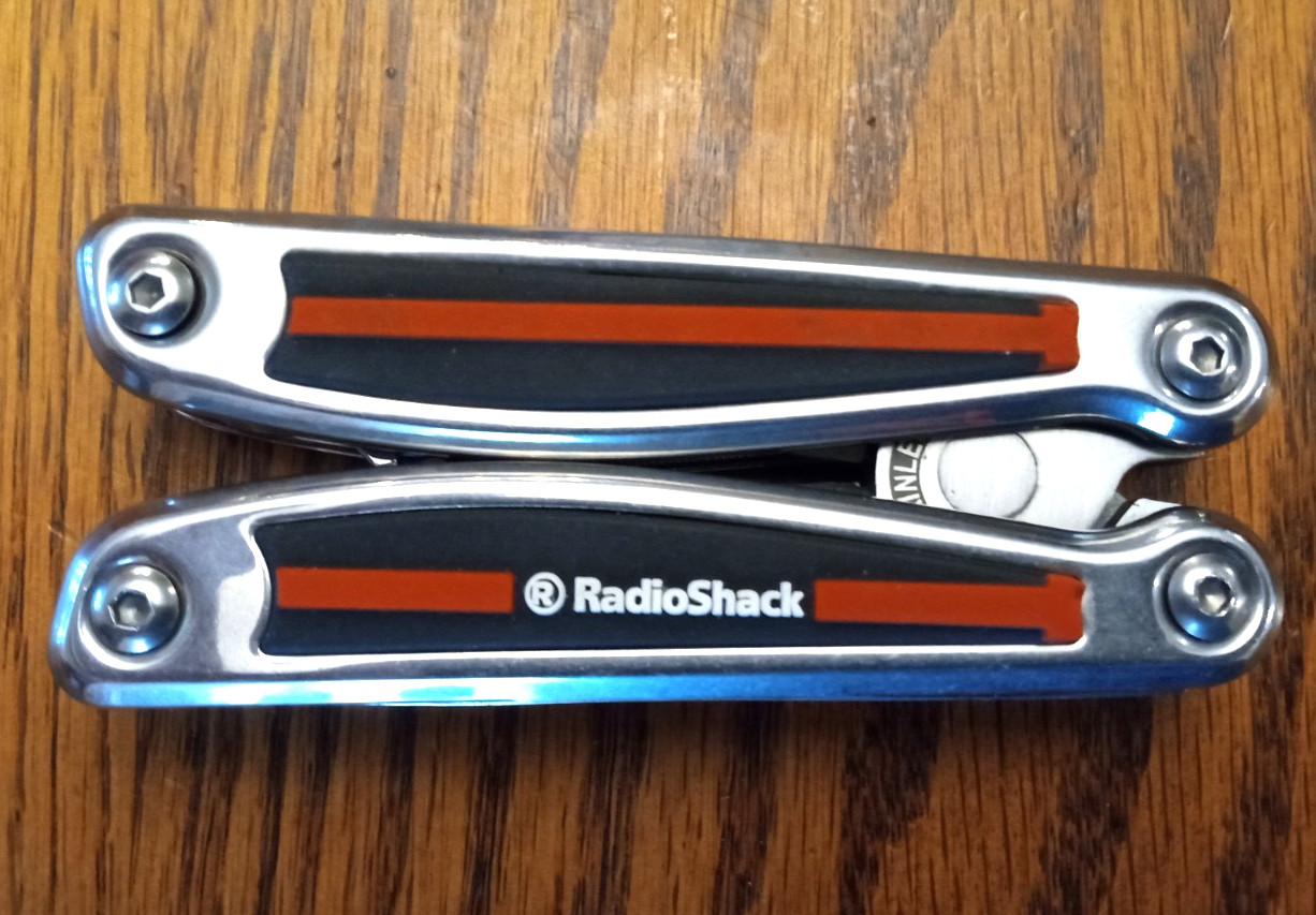 Radio Shack Stainless Steel Multi-Tool w/ 11 Tools. Pocket Knife. Rubber Grip