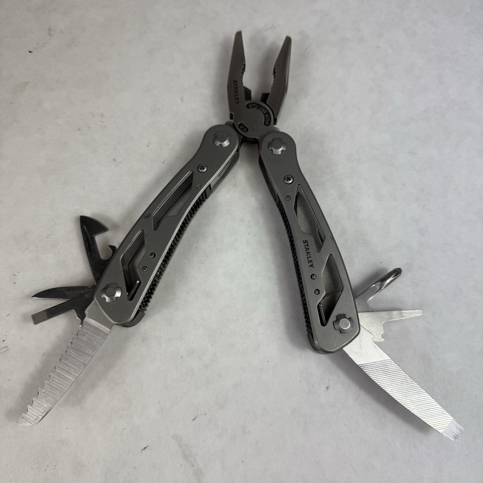 Stanley Multitool 2CR 12-in-1 Grey Stainless Steel Knife Plier Drivers W/ Case