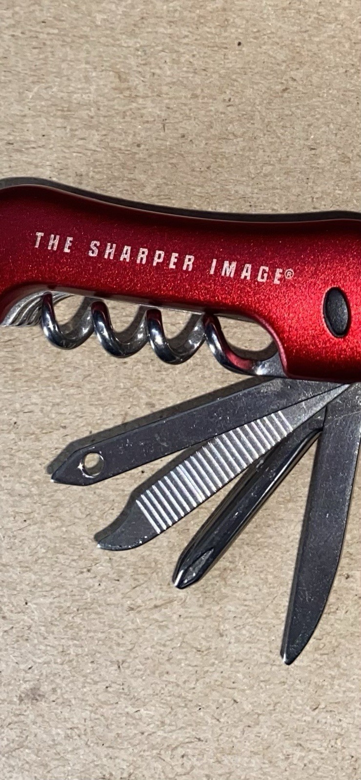 The Sharper Image Multi-Tool 11 in 1 Pocket Knife similar to a Swiss Army knife