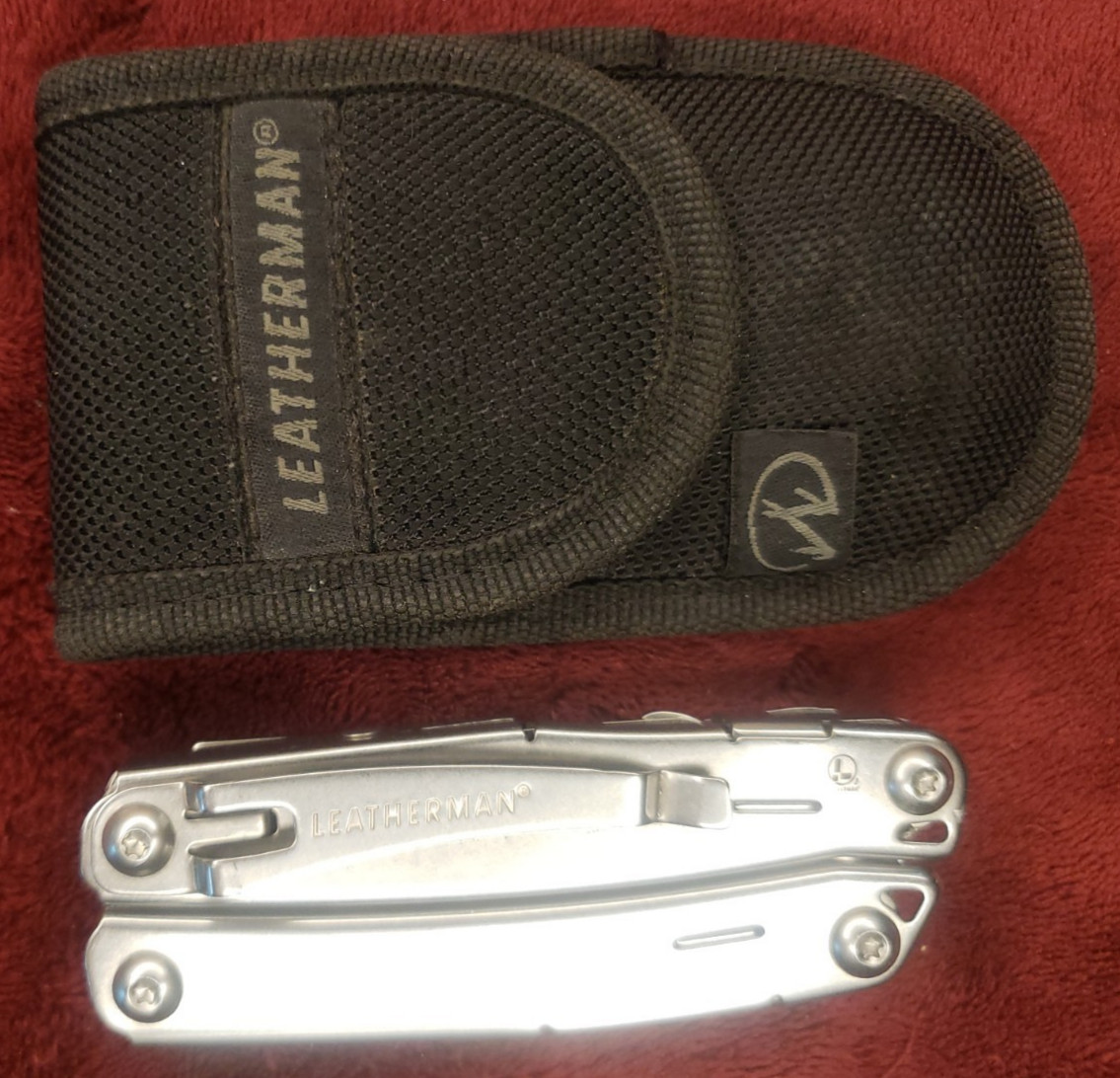 Leatherman Wingman Multi Tool with Sheath with light damage 0120 Date Code