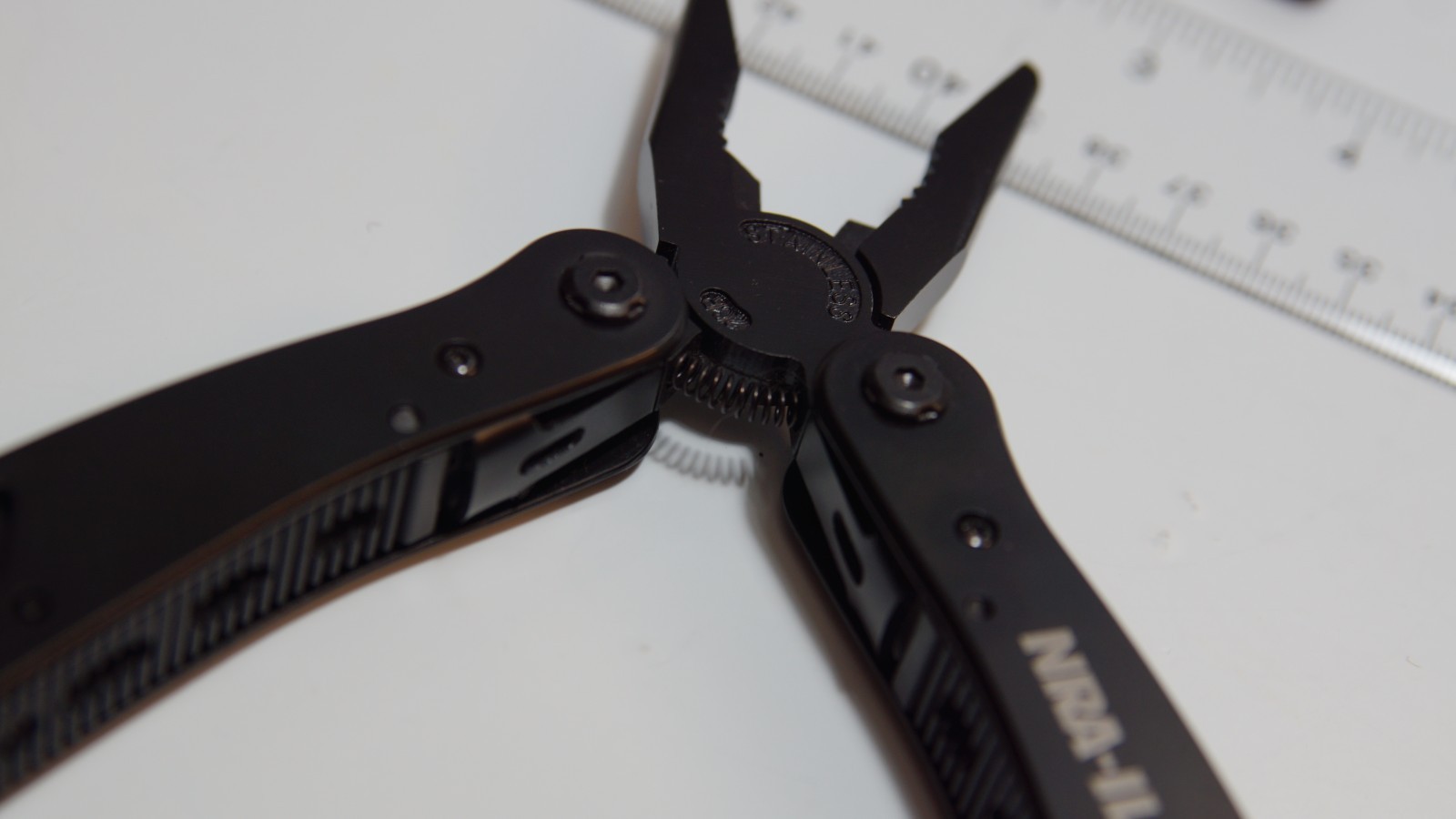 NRA‑LIA Black Multi‑Tool w/ Bits & Nylon Sheath – Knife Saw Pliers Set
