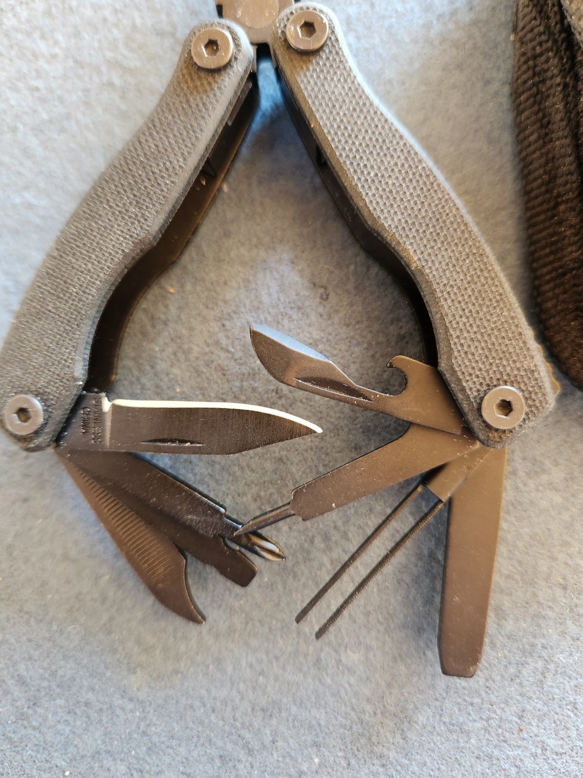 Multi Tool Pliers, Wire Cutter, Saw, Knife, tweezer, Black 10 tools, unused