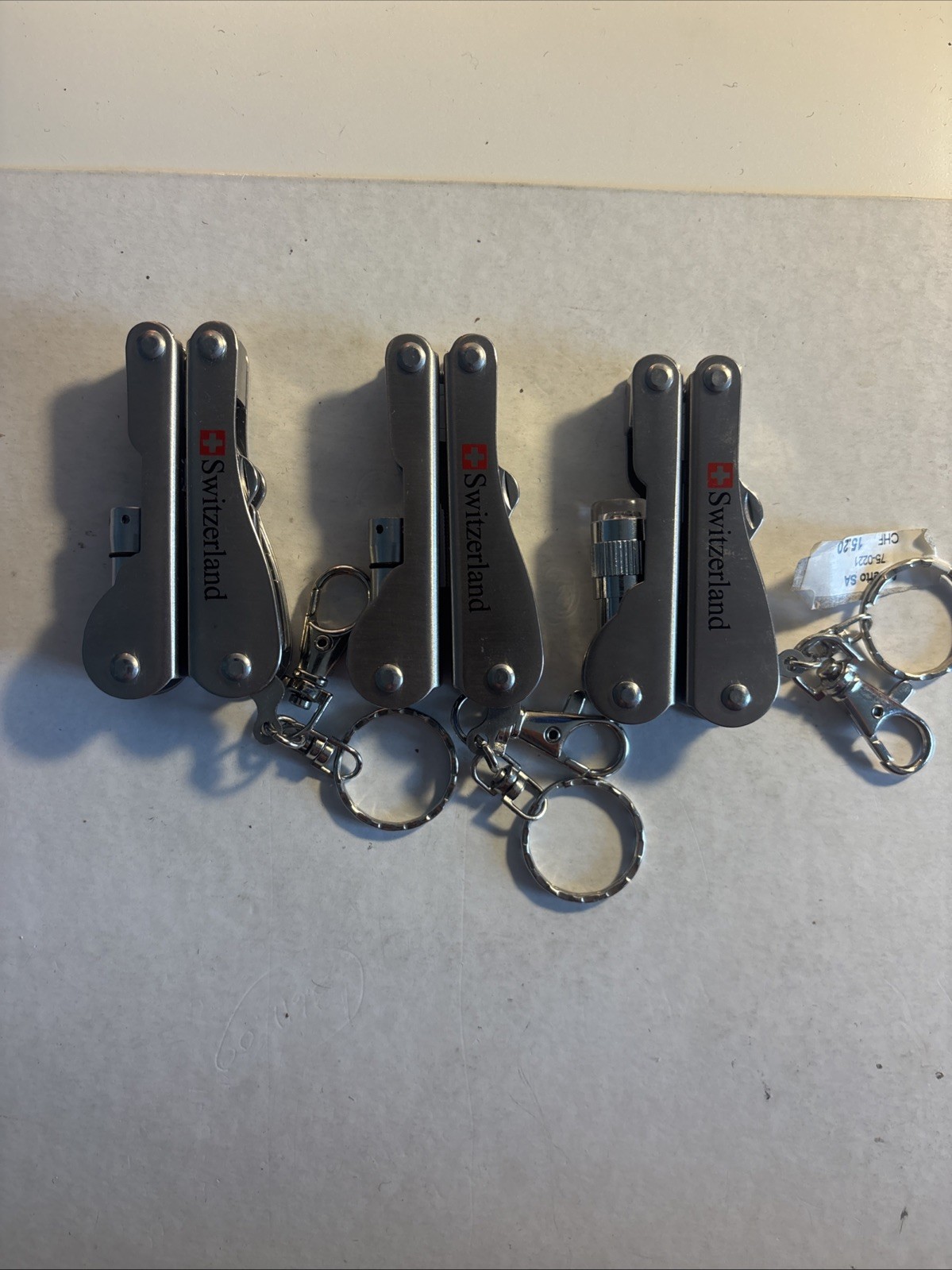 Multi tool folding Knives, pliers/light From Switzerland