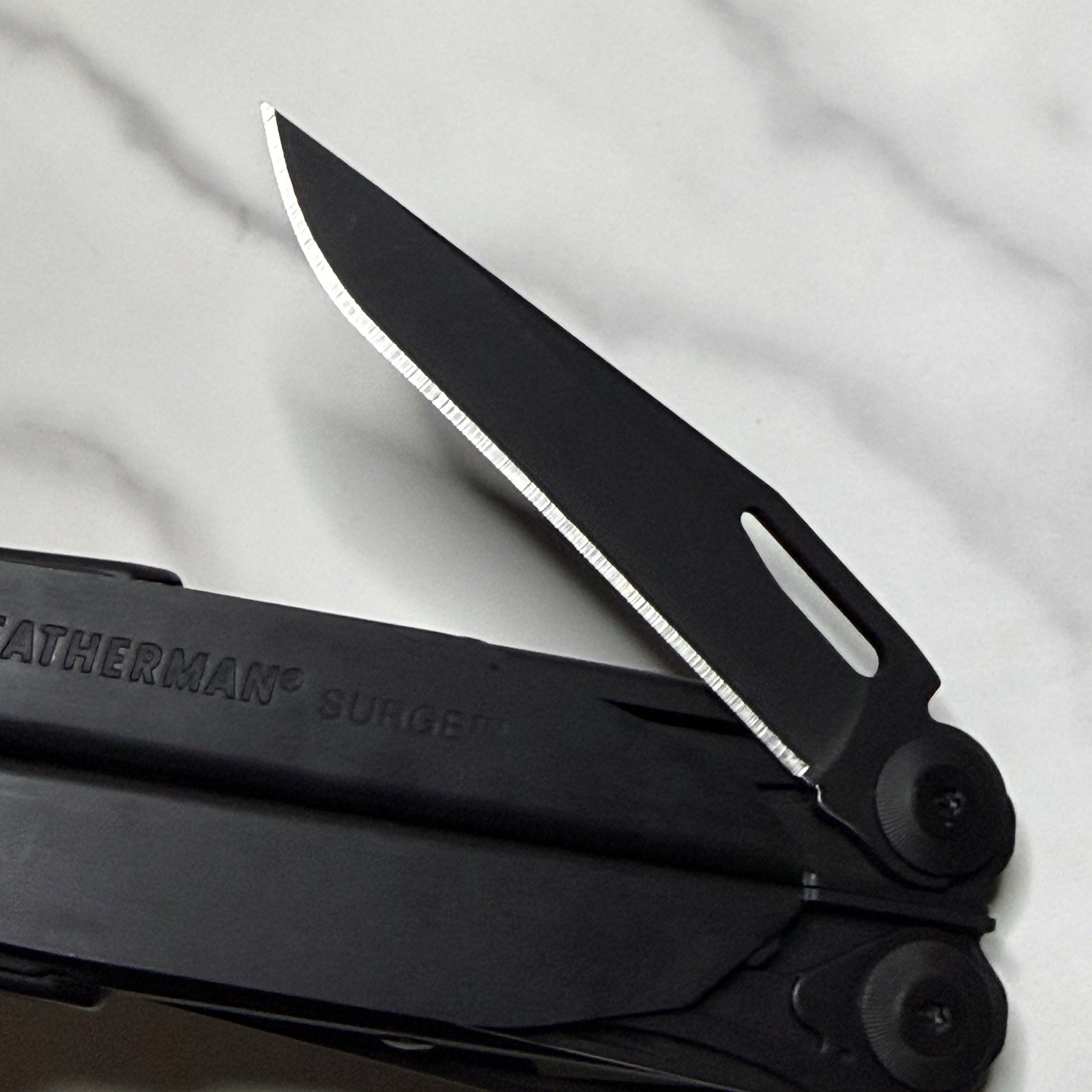 Leatherman Surge Cap Crimper Black Multitool w/Molle Sheath. Discontinued