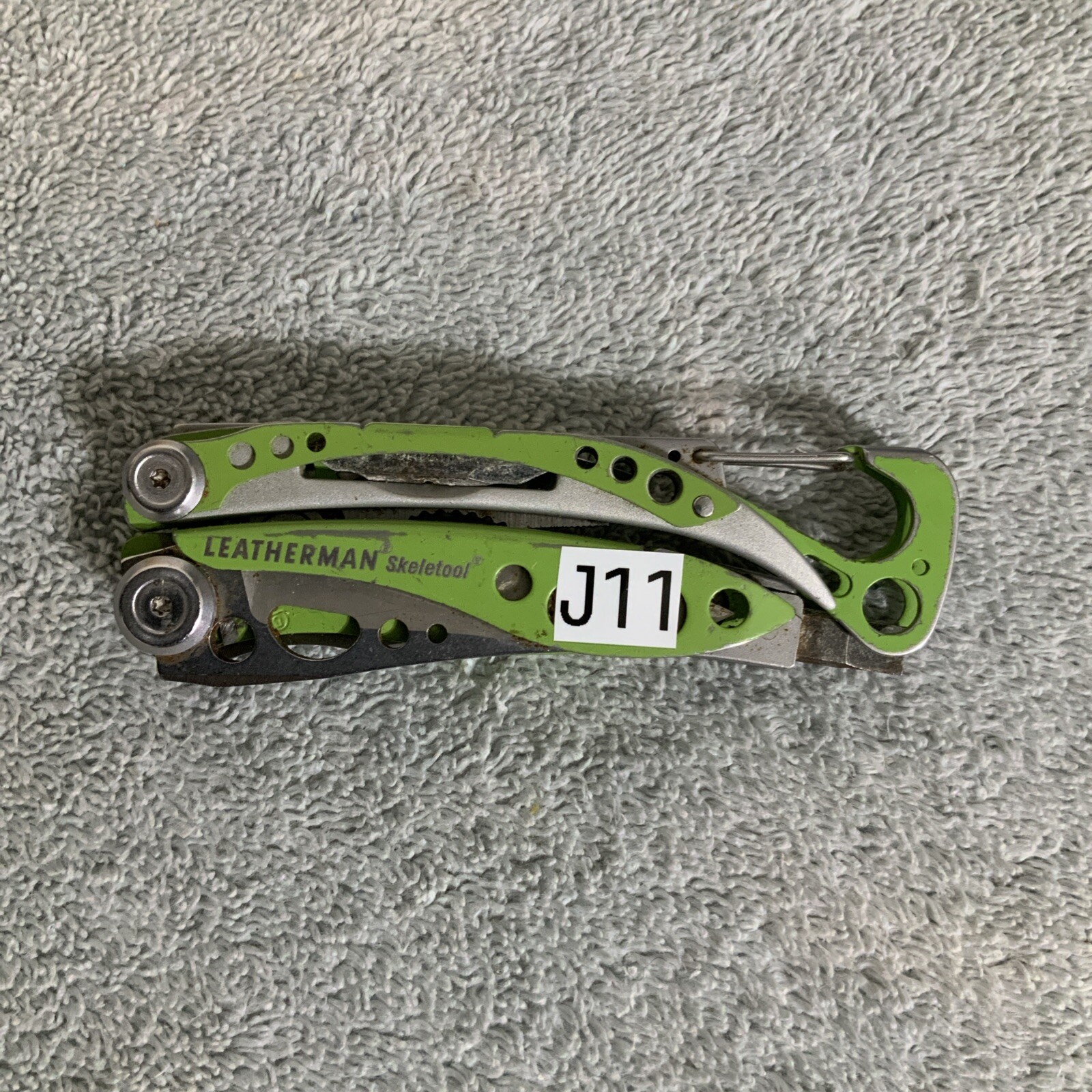 Retired Leatherman “Skeletool Lime Green” Stainless Steel Multi Tool Rust – J11