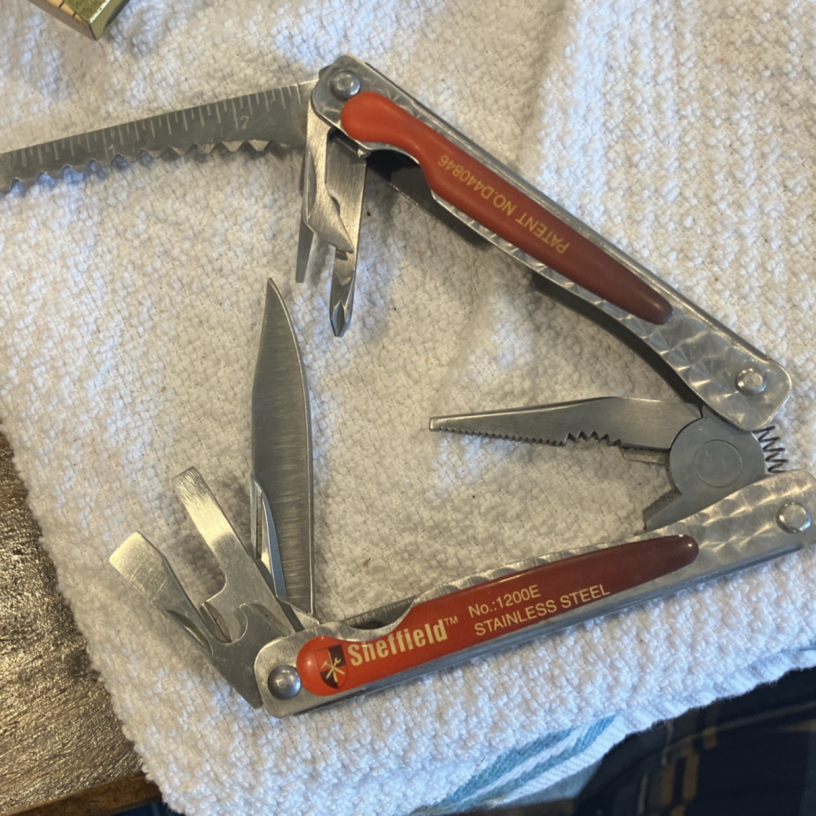 Sheffield 1200E Stainless Steel Multi-Tool Pliers Knife Red Silver