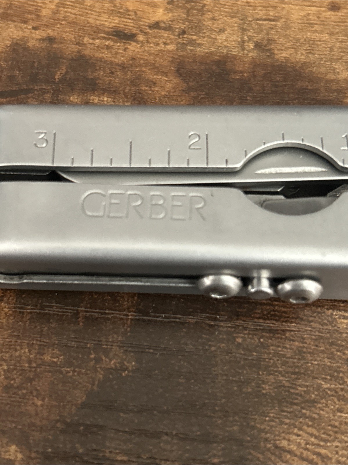 Gerber Stainless Steel Multi-Tool 7-in-1 Pliers Knife File Can Opener Ruler
