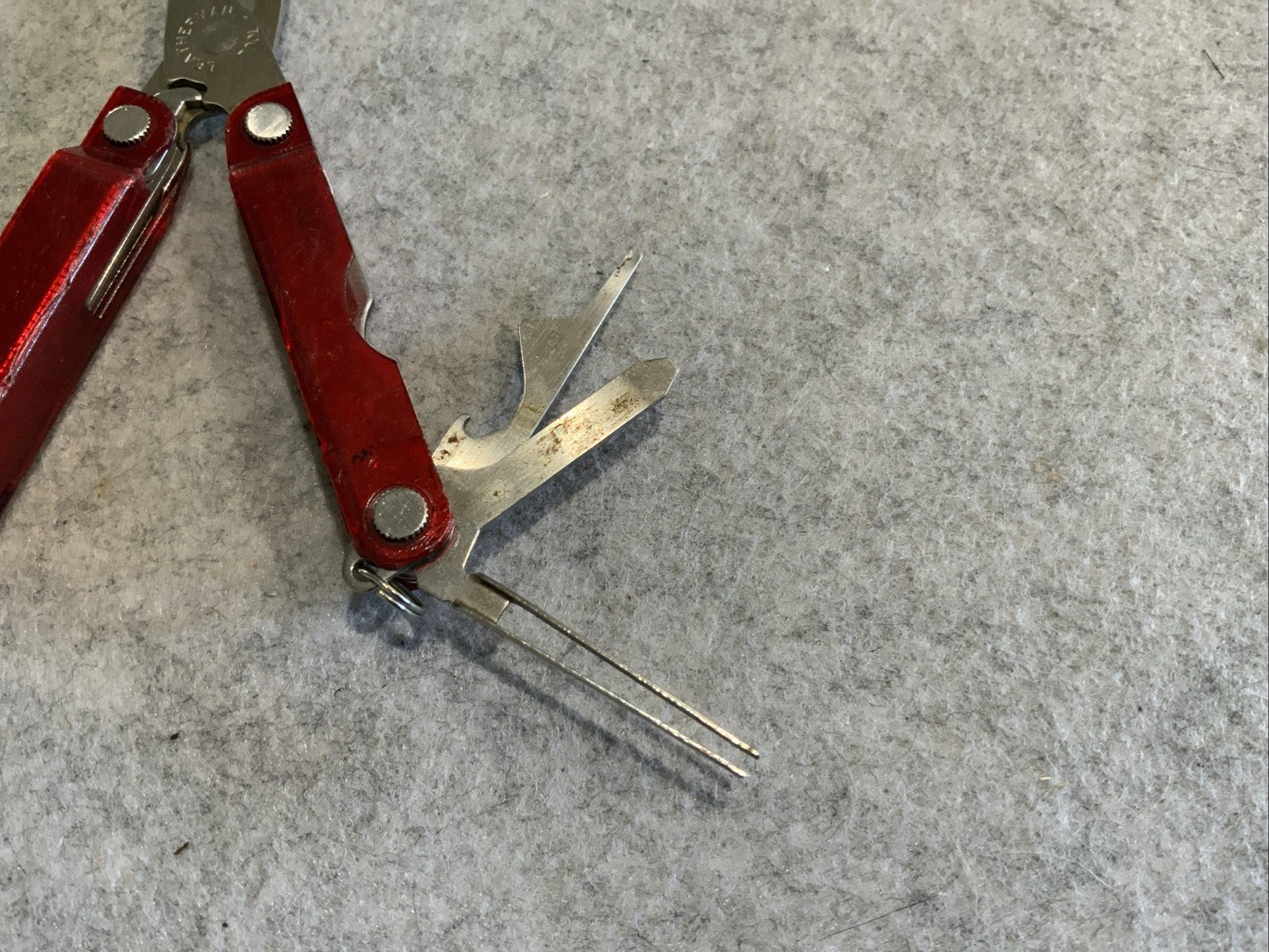 Leatherman Micra Multi Tool Red Transparent Plastic Coating Chipped