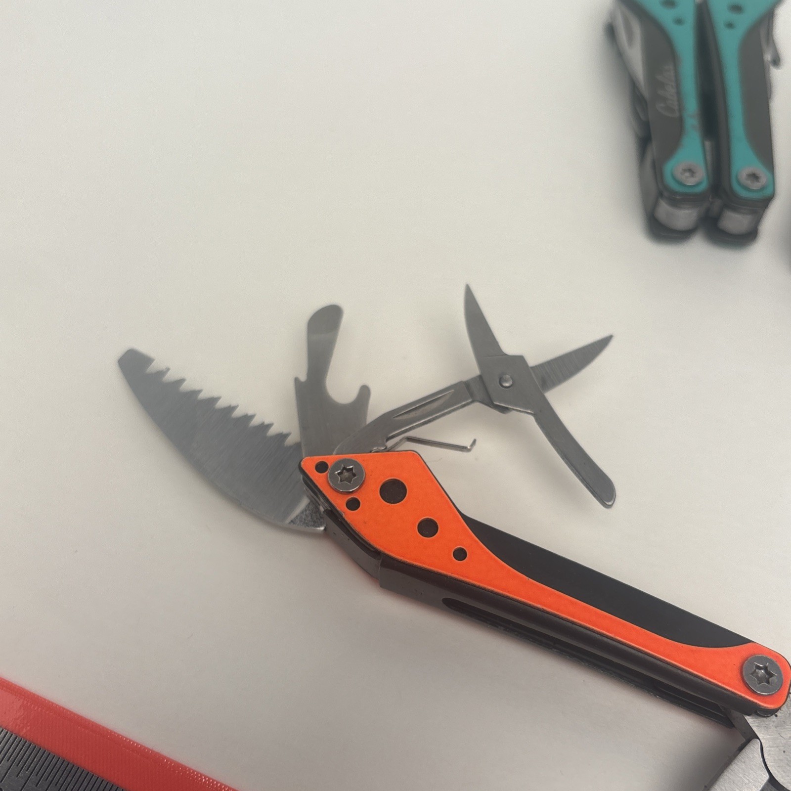 Cabela’s LOT of 4 Orange Teal Silver Pink Small Multi-Tool Camp Hike Hunt Fish