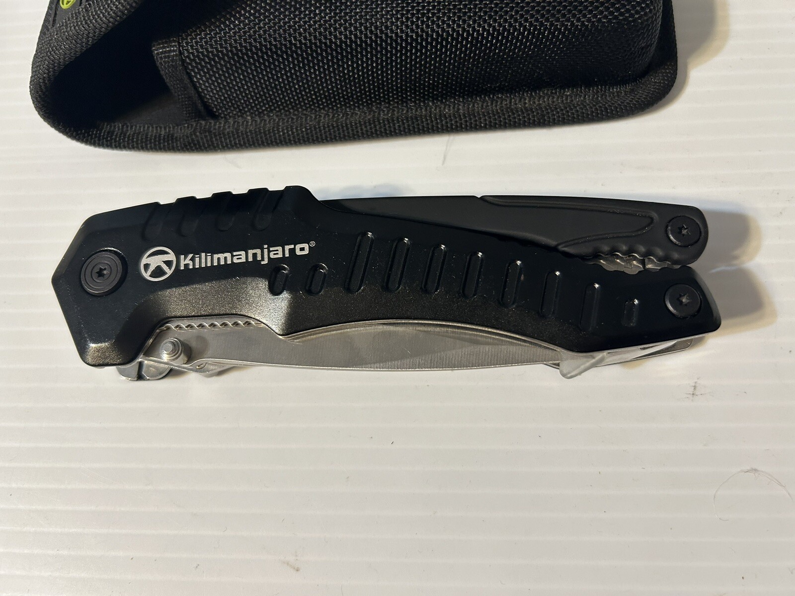 Kilimanjaro Magnus 9-in-1 XL Multi-Tool Folding with Snap Pouch New Never Used.