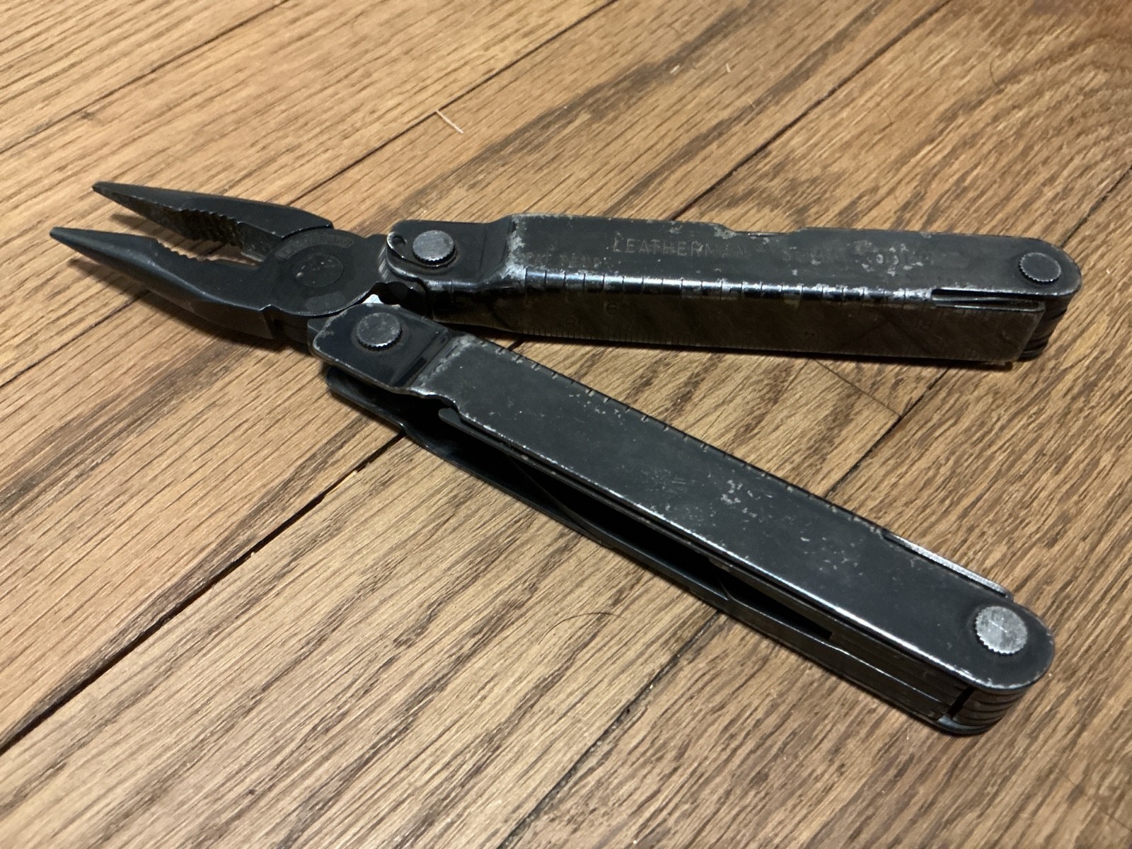 Leatherman Super Tool black oxide with leather sheath, USA made, original