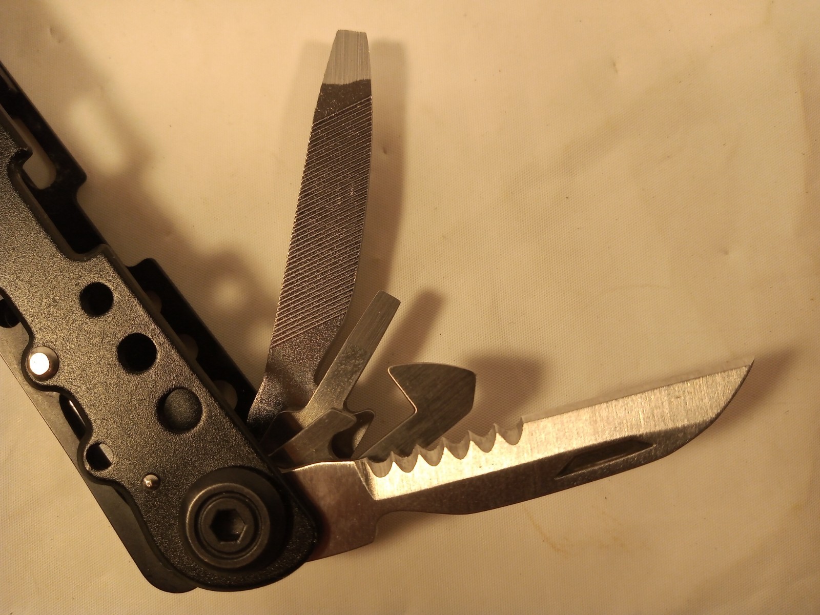 14-In-1 Multi-Tool Pliers Knives Screwdrivers Opener Fish Scaler Saw File Ruler