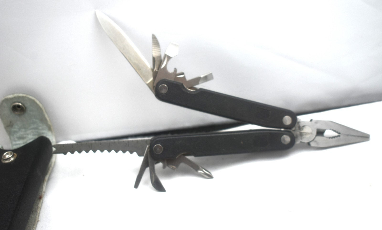 COMBINATION screwdriver knife plier scaler measure screwdrivers opener etc.