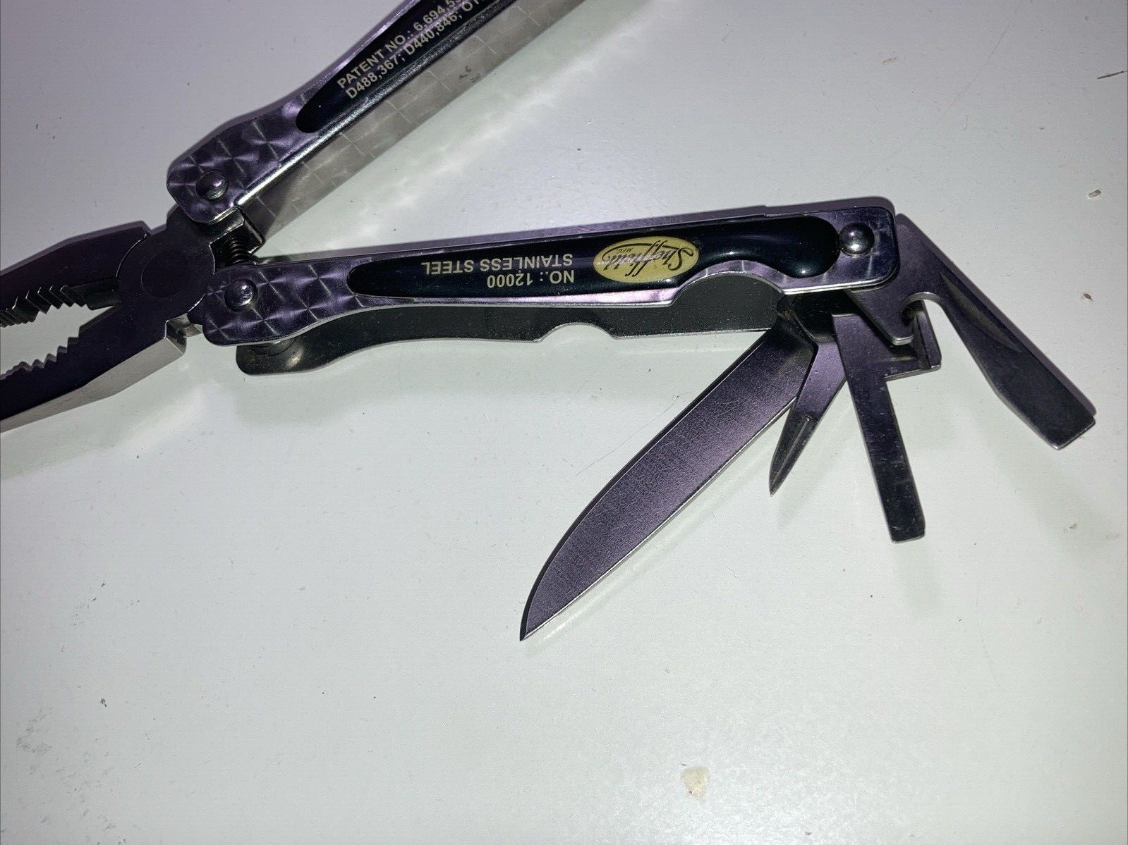 Sheffield N0. 12000 Multi Tool Fish Scaler Spring Loaded Needlenose Pliers