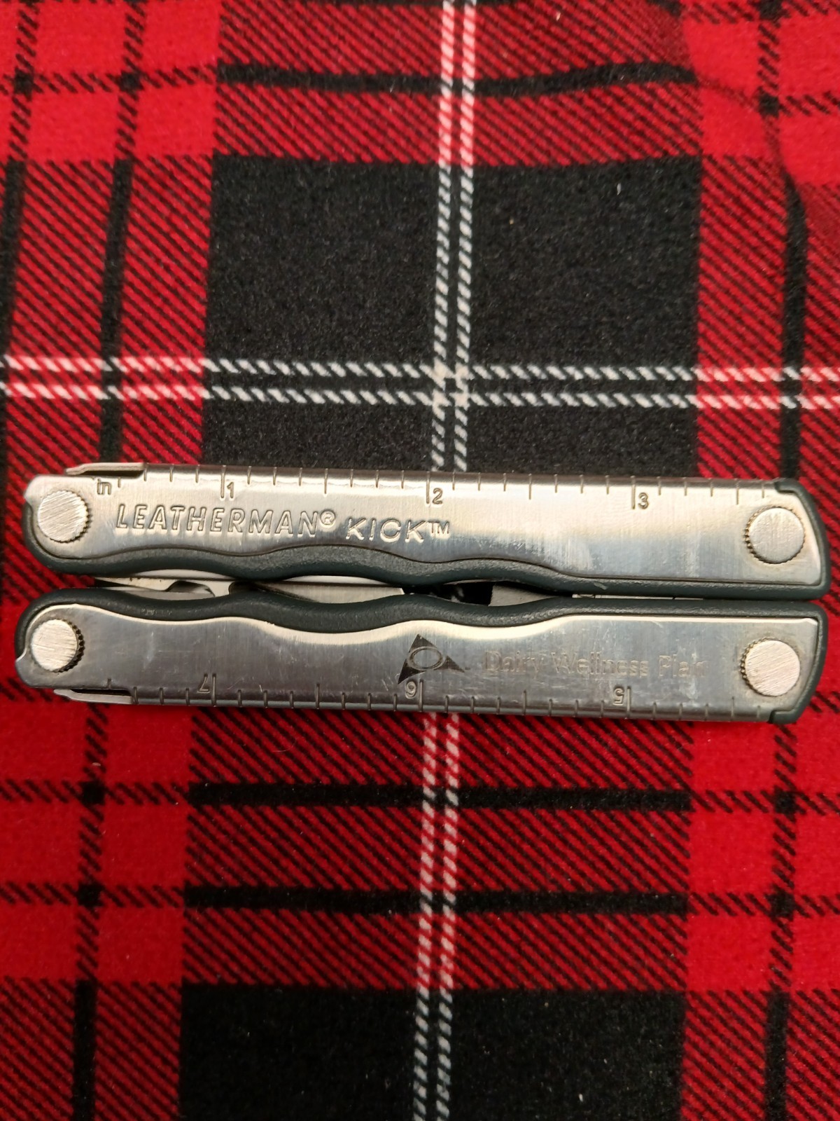 Leatherman Kick Multi-Tool In good Shape Has Dairy Wellness Plan Stamped on Side