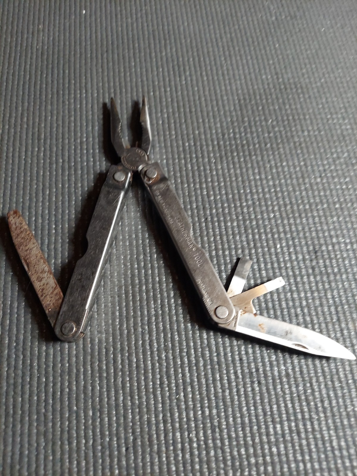 Original vintage Leatherman multi-tool, U.S. registered trademark (TM 1325473).