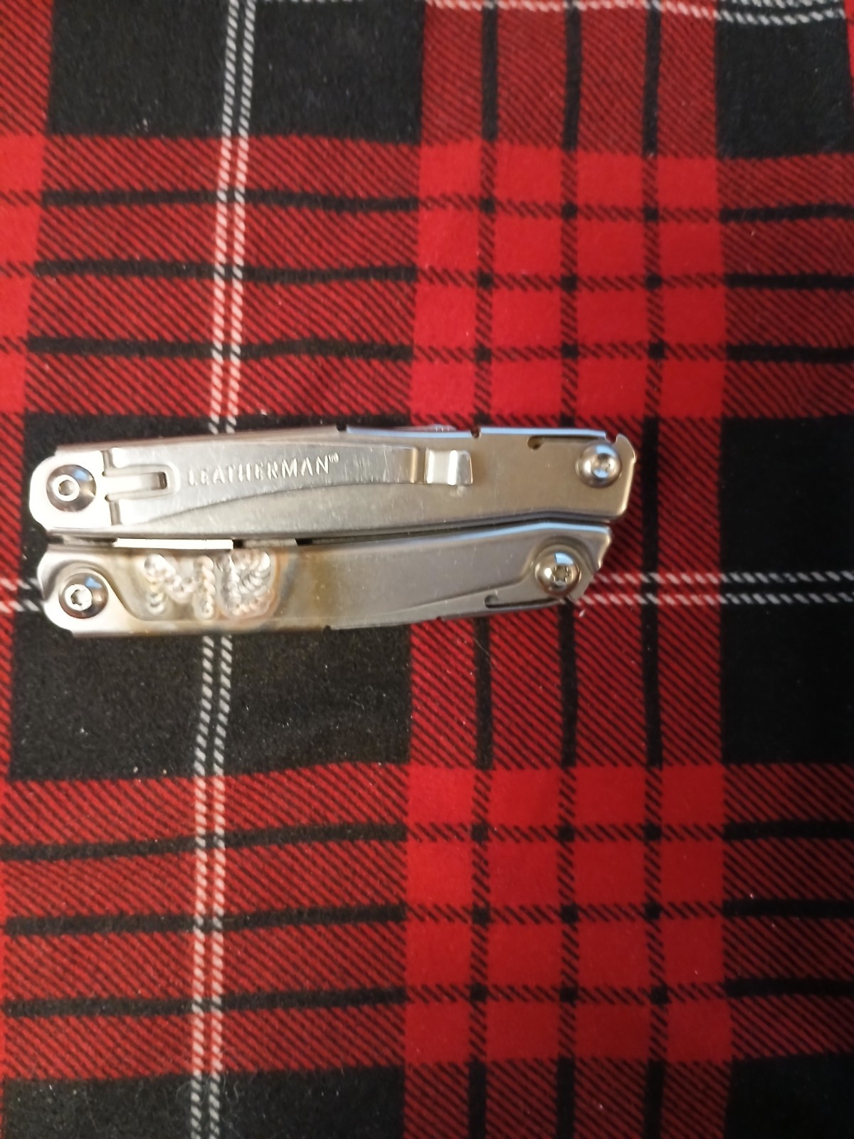 Leatherman Rev Multi-Tool with MO Welded on the surface