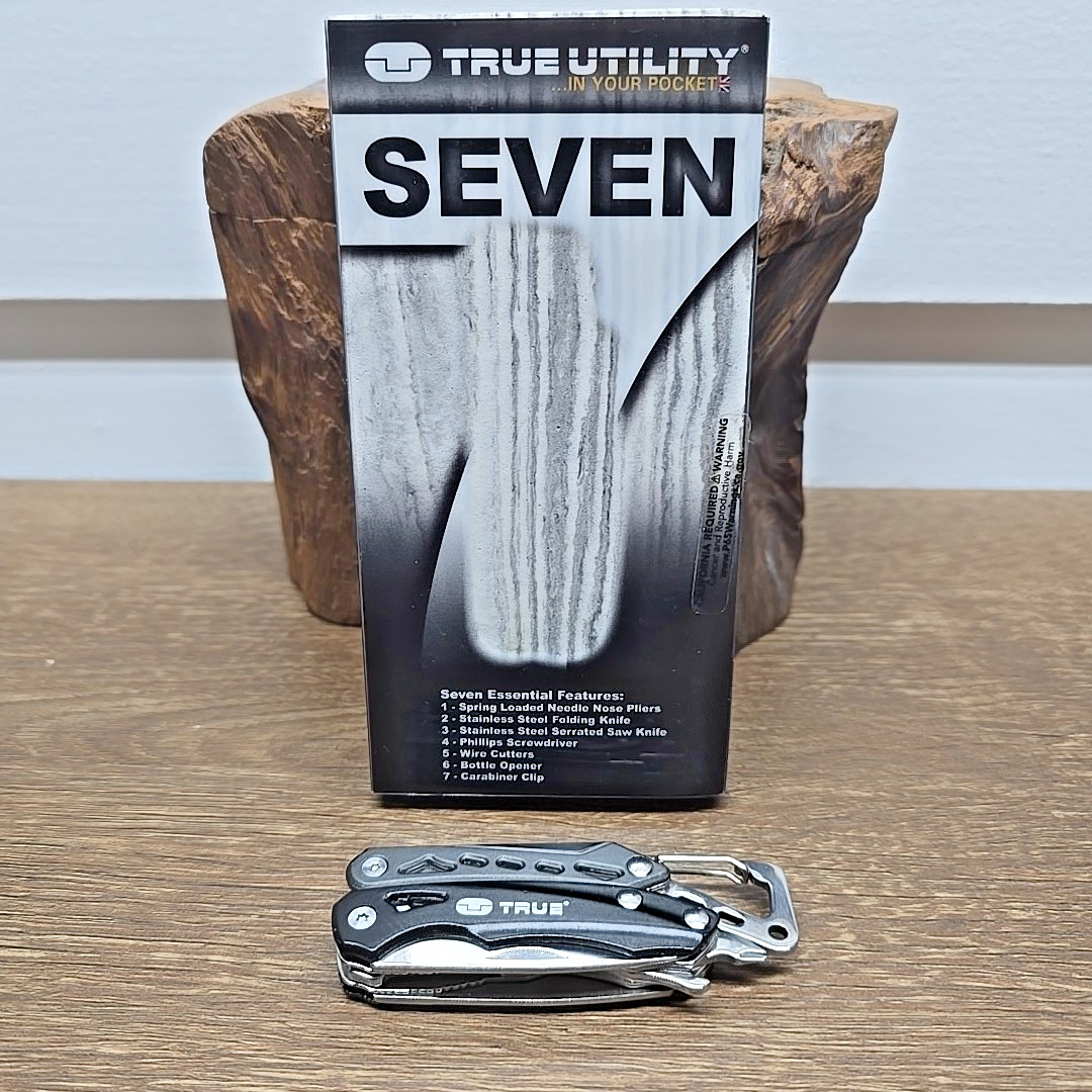 True Utility TU180F Seven Multi-Tool Saw Knife Wire Cutters Pliers Screwdriver..