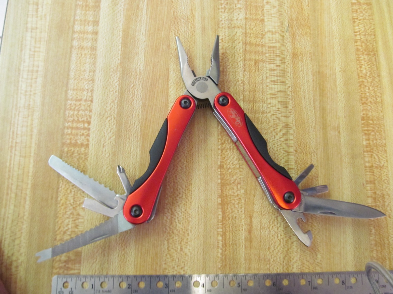 Lot of 8 Various brands inc. Winchester and Coast Multi Tools