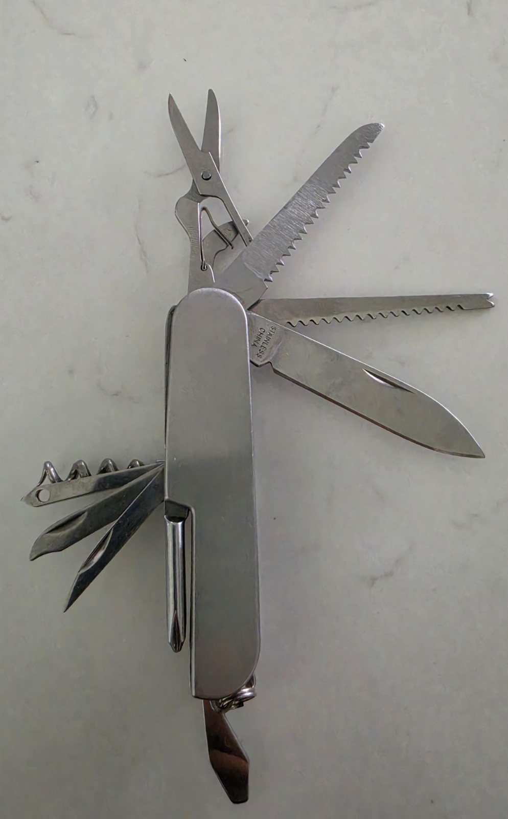 Mueller Co. Stainless Steel 12-in-1 Multi-Tool Knife Saw Scissors 2″ Blade